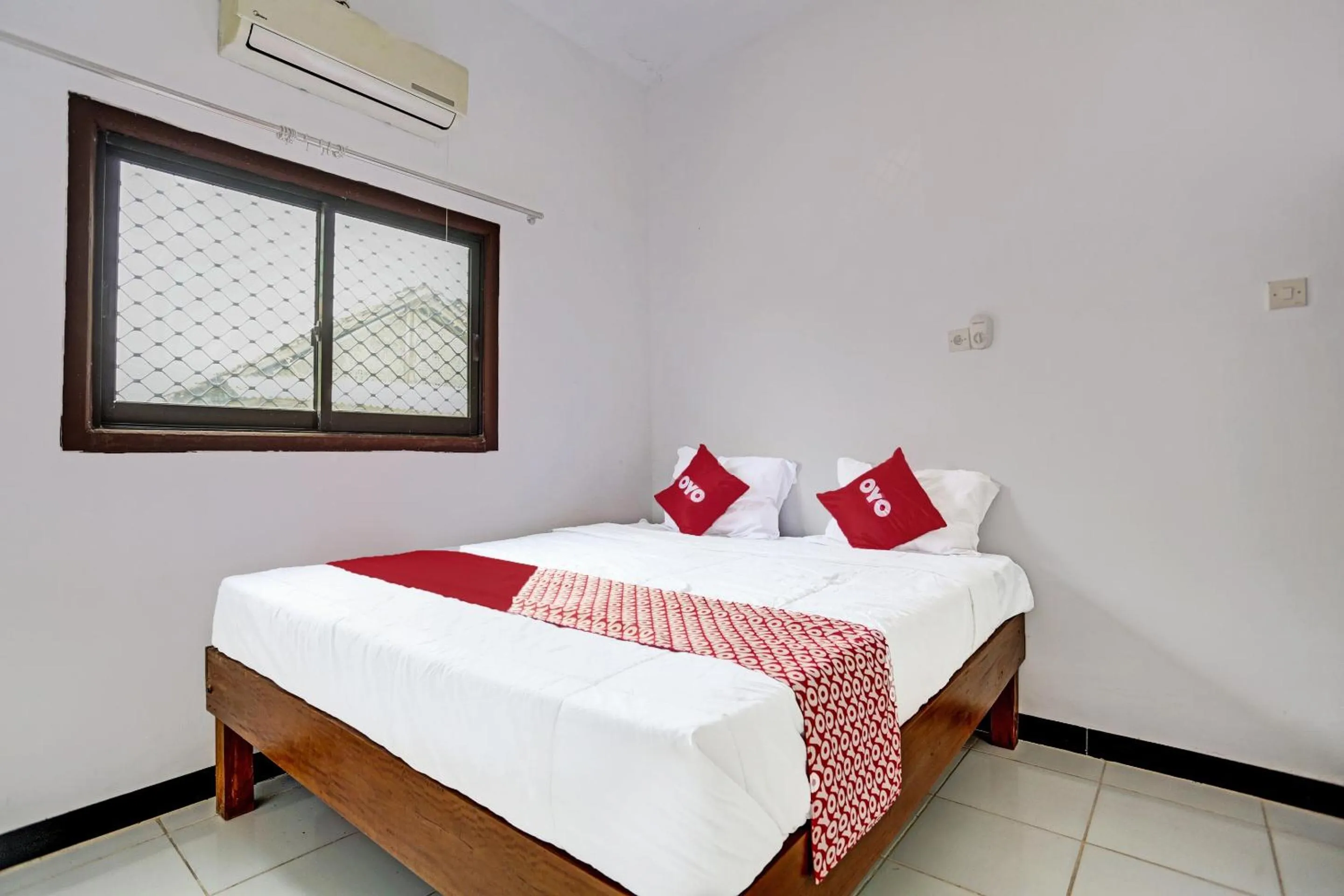 Bedroom in OYO 91773 Ab Homestay