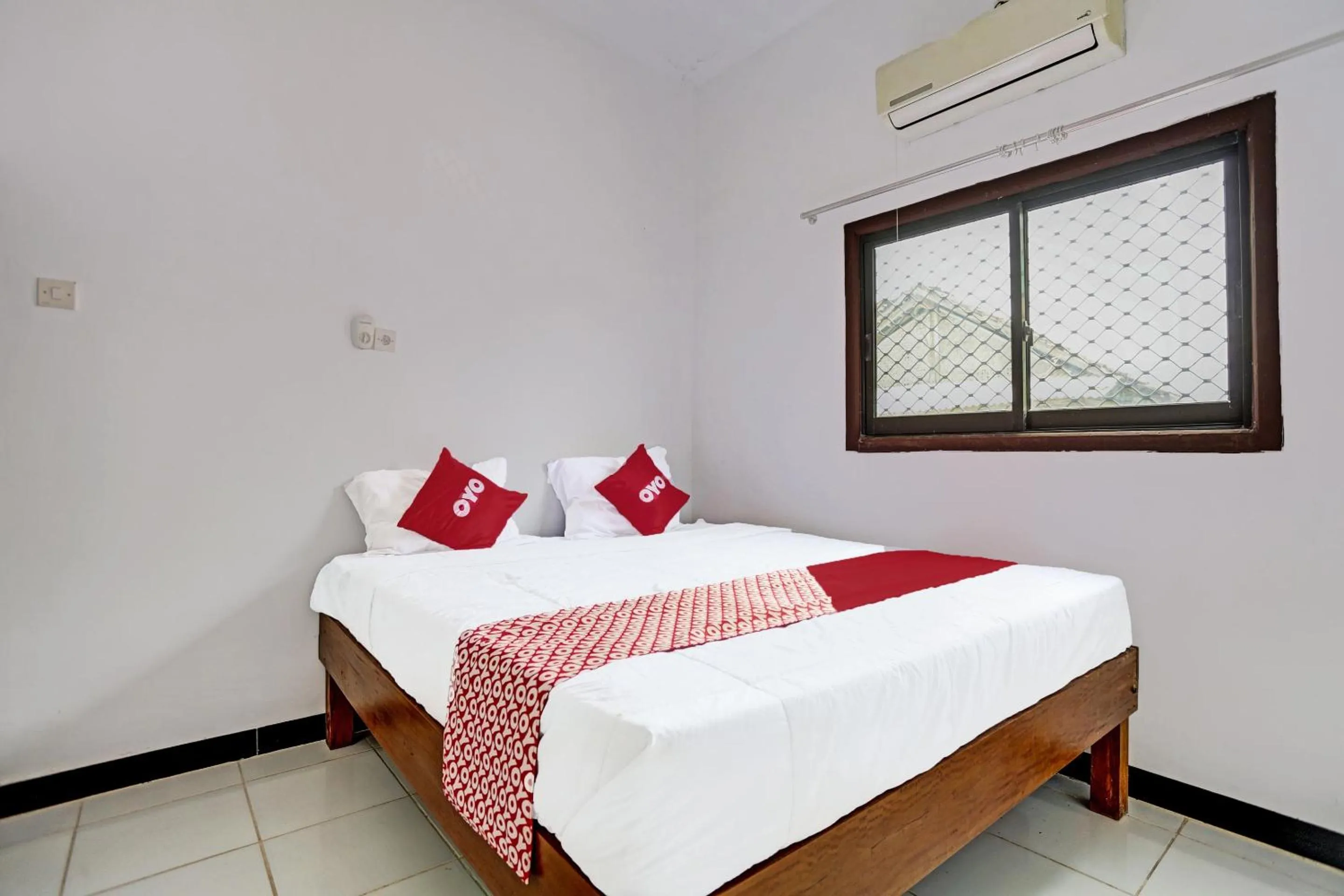Bedroom in OYO 91773 Ab Homestay