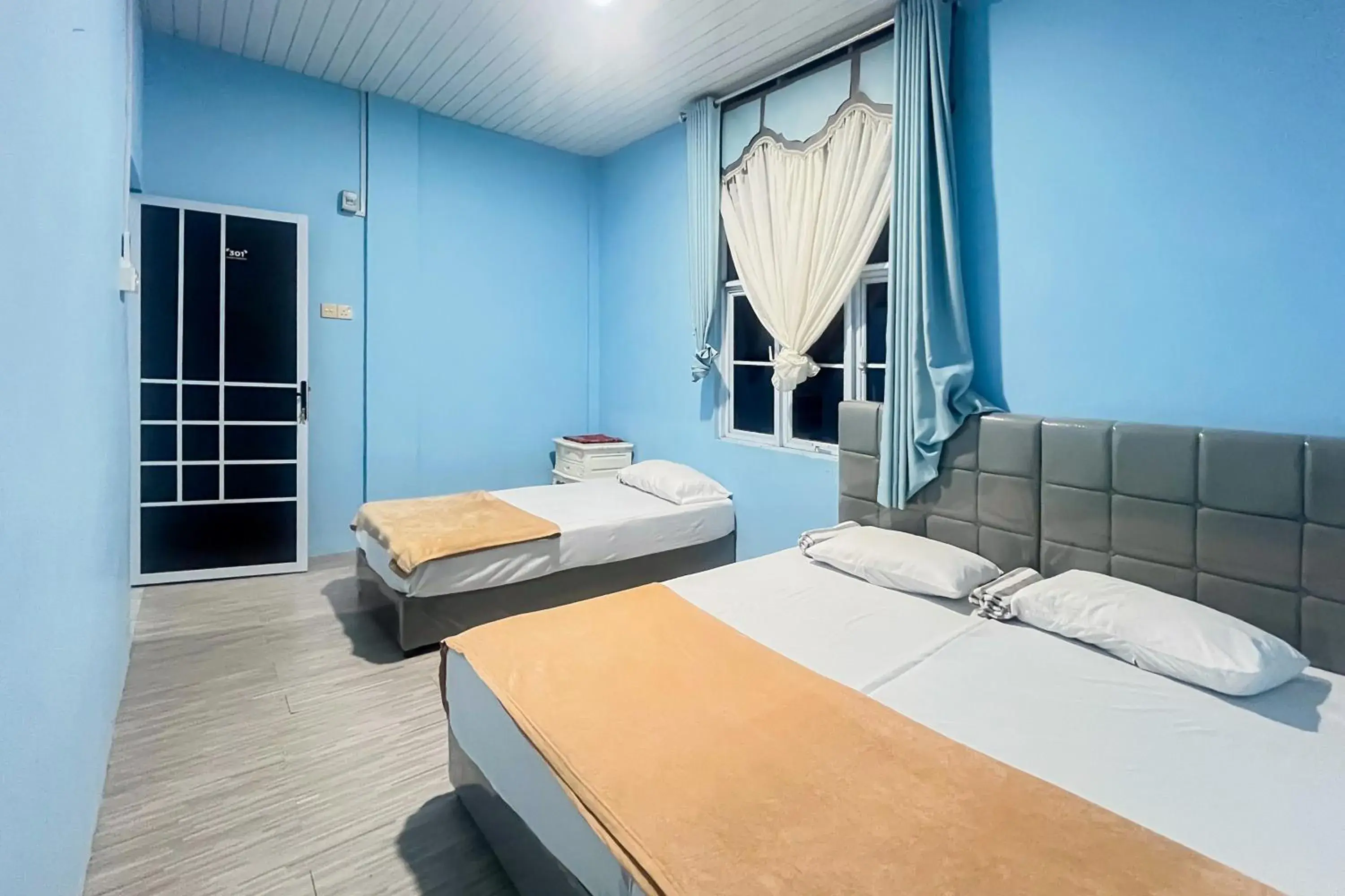 Standard Twin Room in Zazezo Homestay Syariah RedPartner Standard Twin Room in Zazezo Homestay Syariah RedPartner