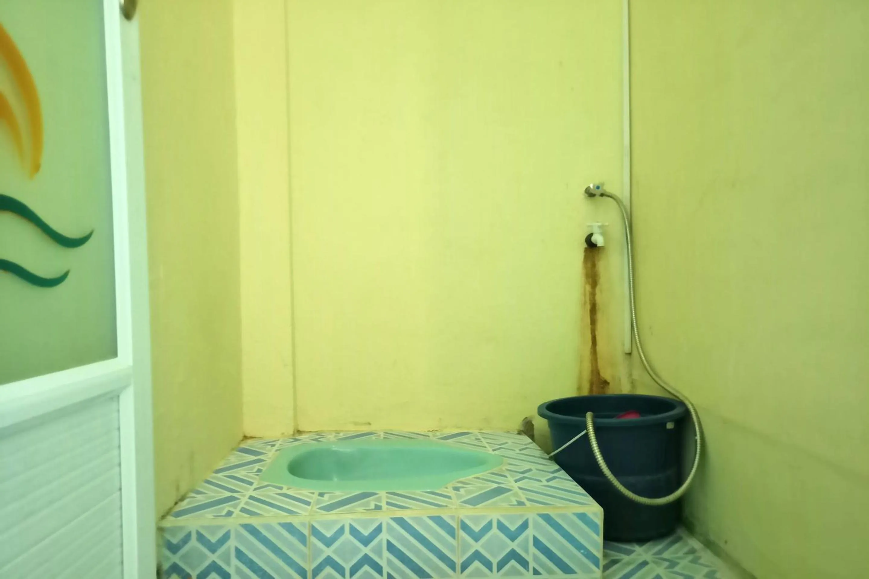 Bathroom, Bed in SPOT ON 91791 Homestay Surya Syariah