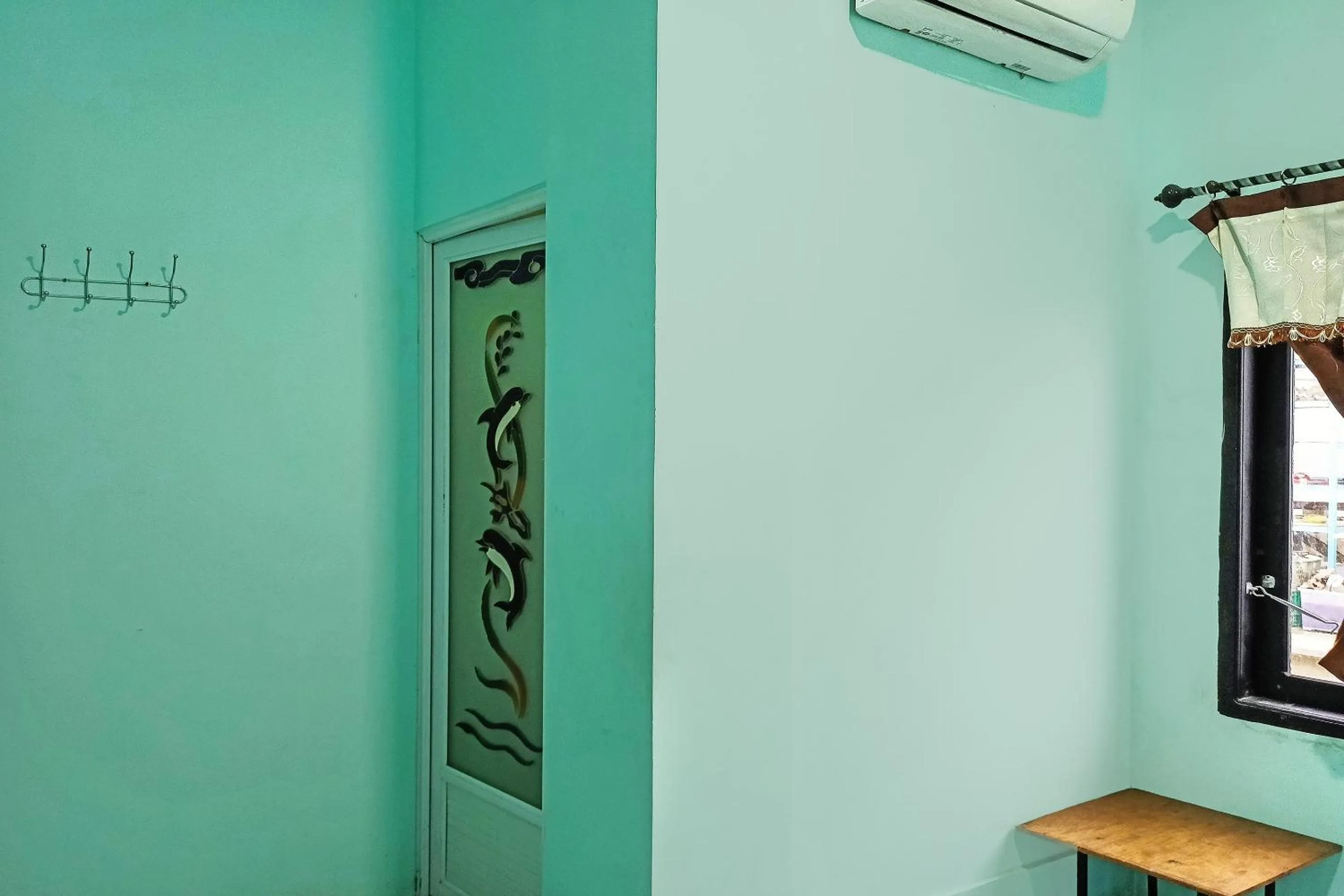 Bedroom in SPOT ON 91791 Homestay Surya Syariah