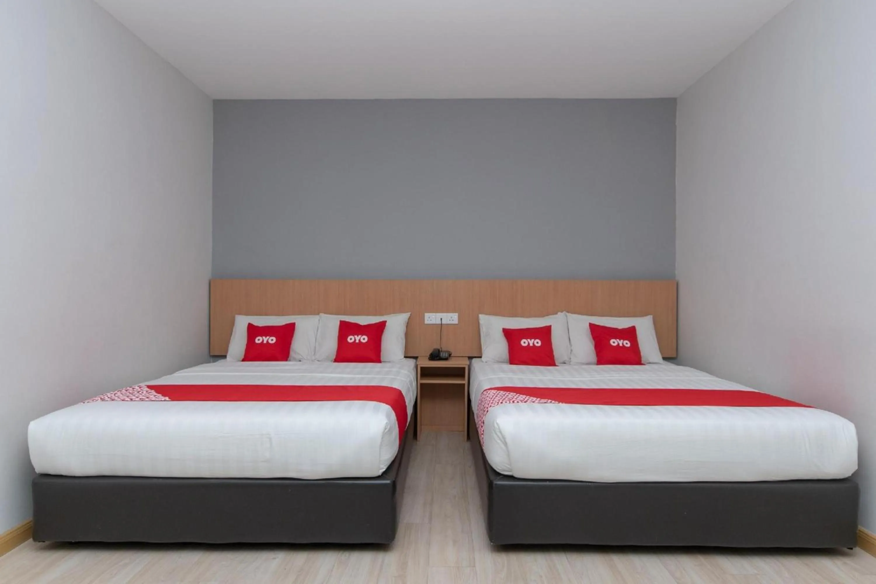 Bedroom in Capital O 89344 Labuan Avenue Hotel