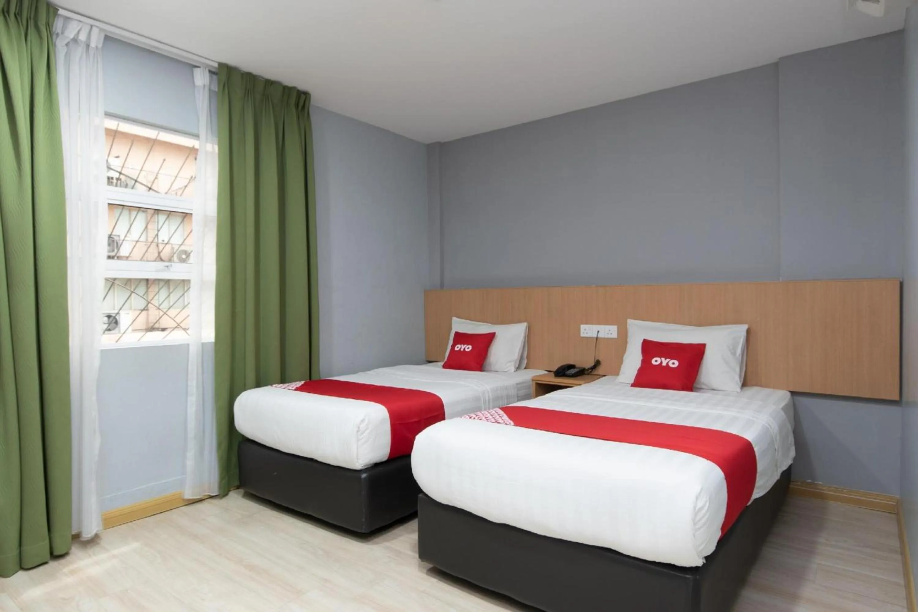 Photo of the whole room in Capital O 89344 Labuan Avenue Hotel