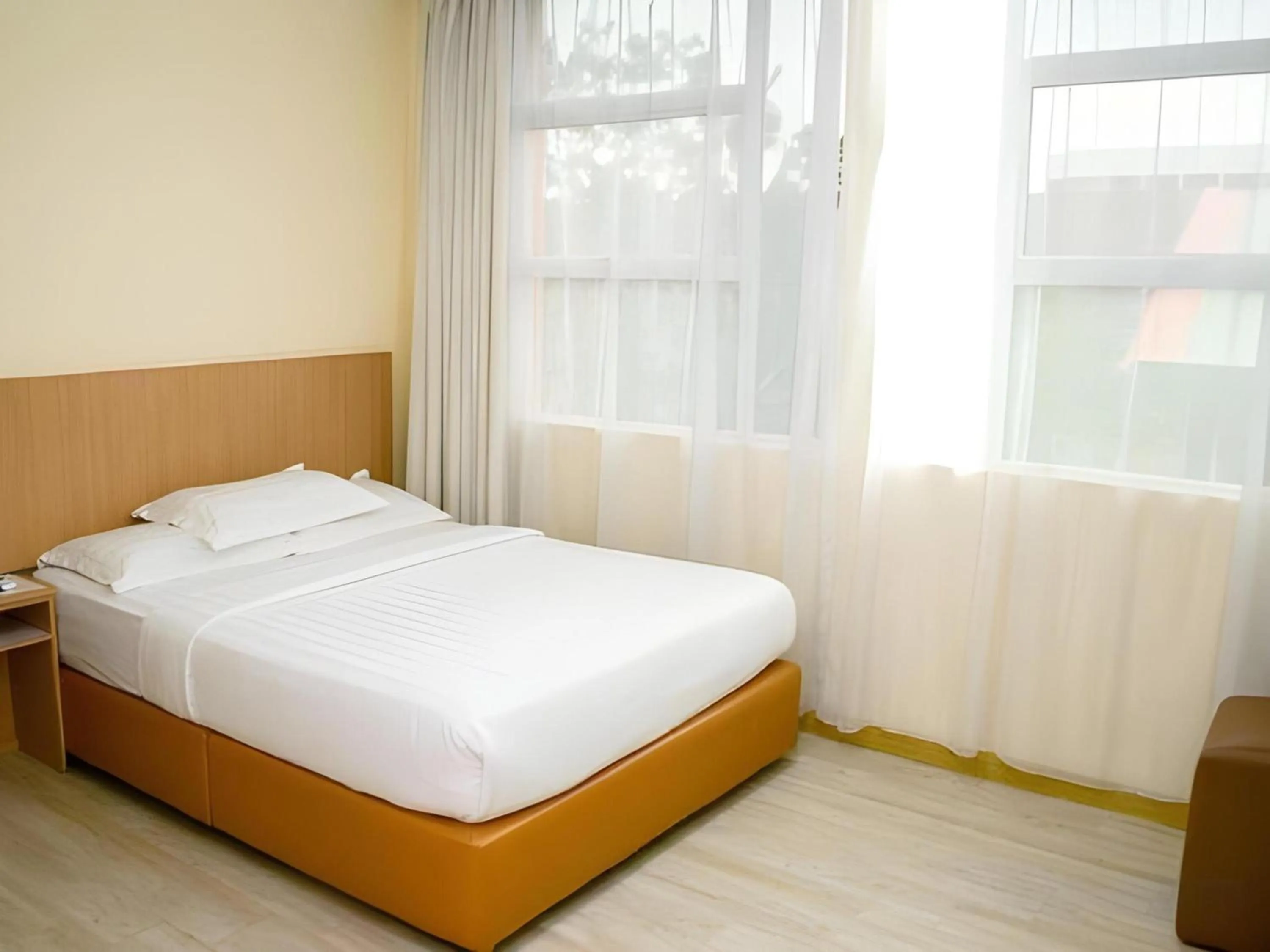 Photo of the whole room in Capital O 89344 Labuan Avenue Hotel