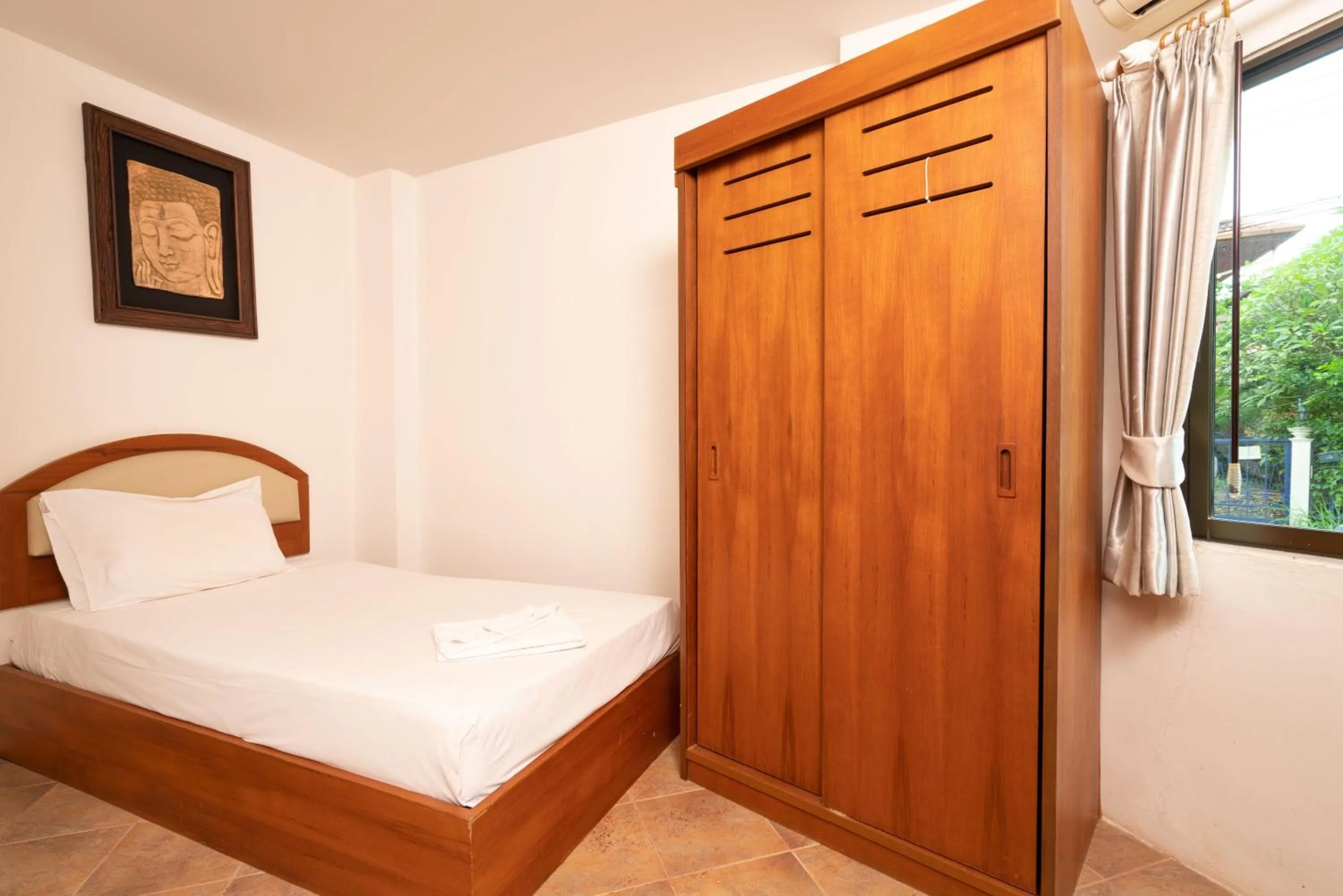 Bed in Sai Rougn apartment