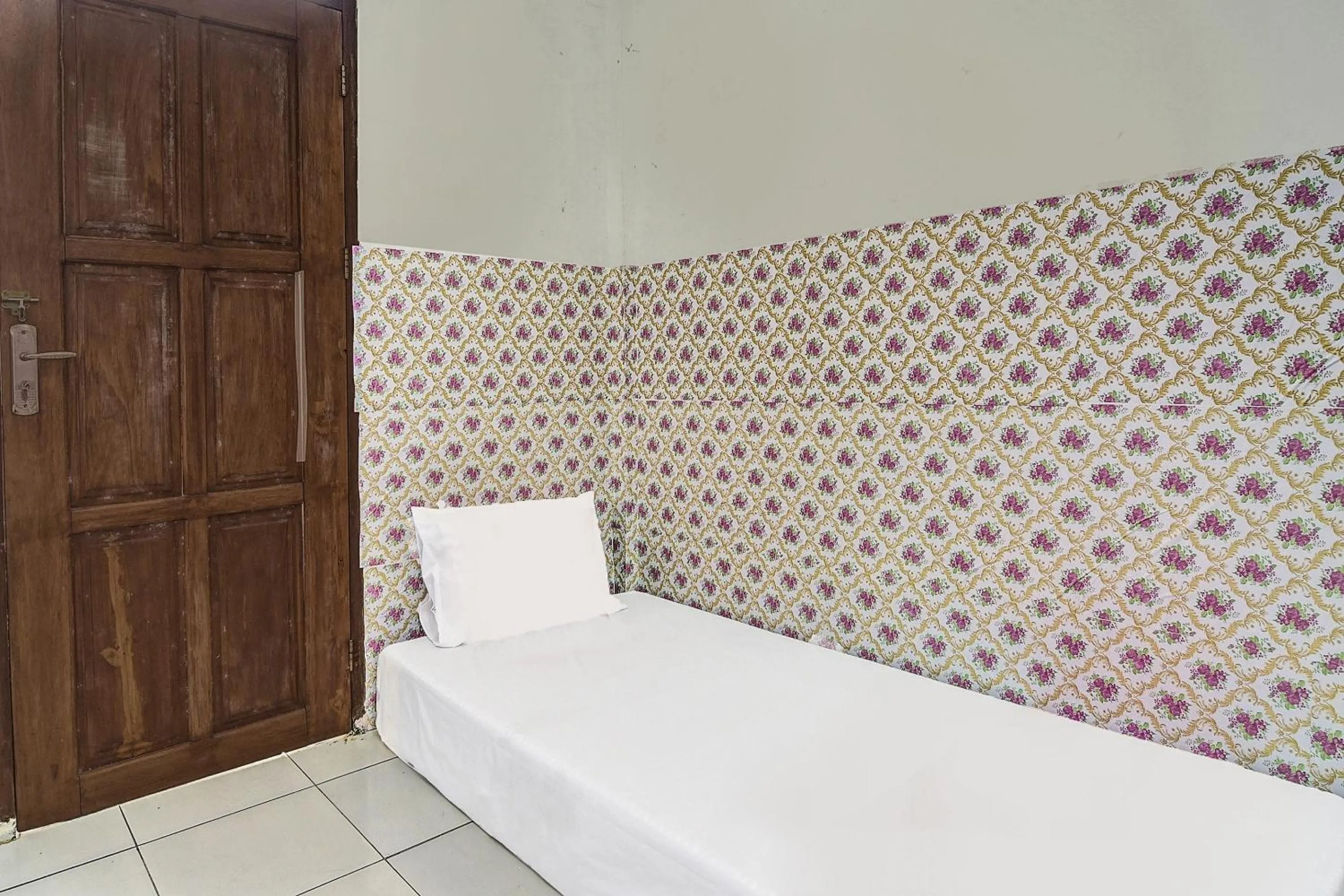 Bedroom, Bed in Hotel O Sosonopan Homestay Near LANTAMAL VIII MANADO