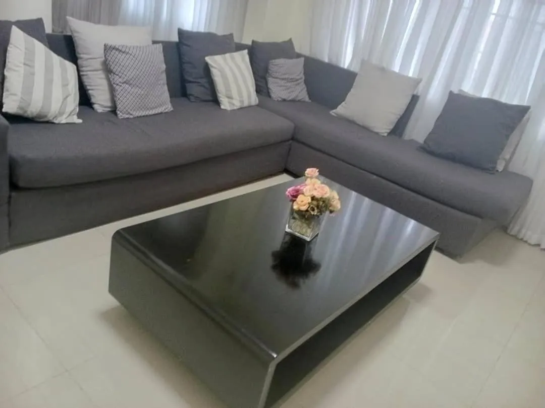 Communal lounge/ TV room in IWACU NOOK