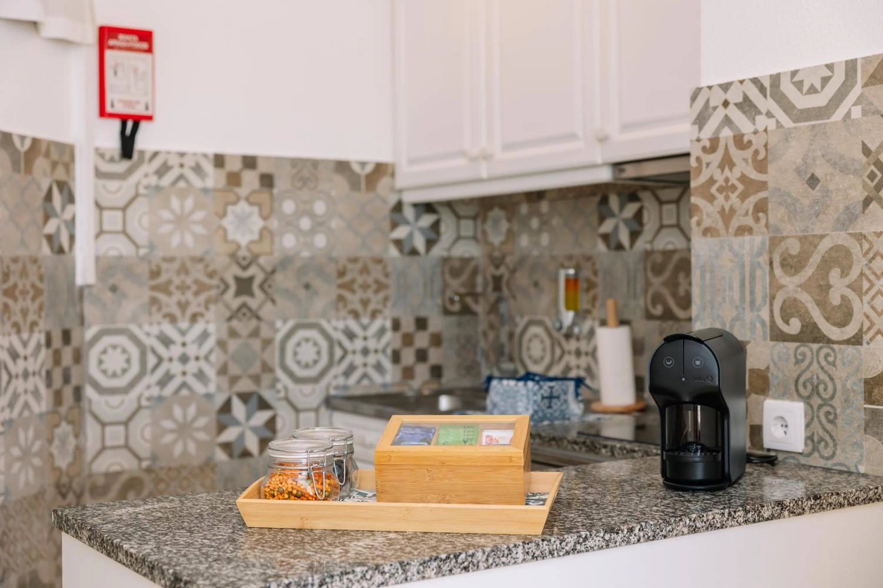 Kitchen or kitchenette in Monicca Collection Suites and Residences