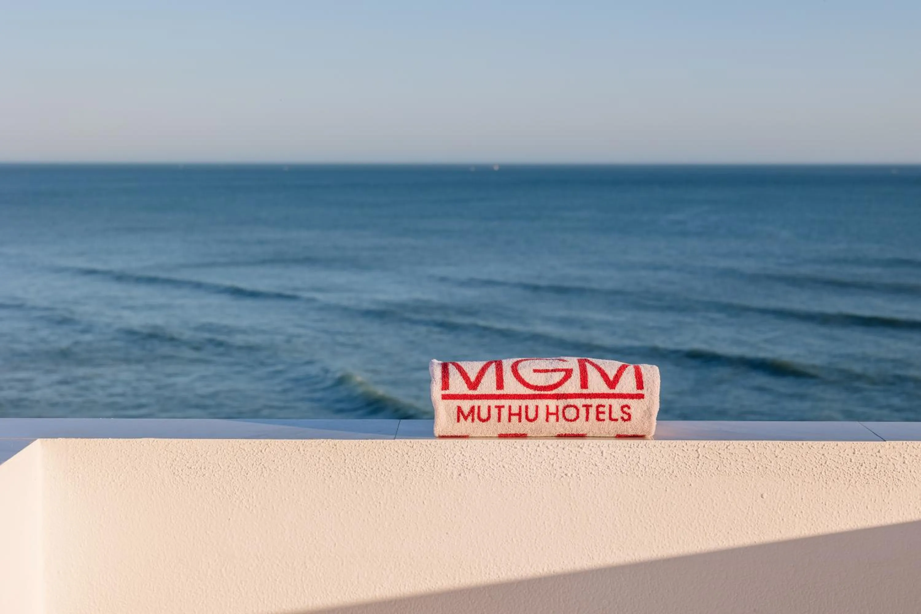 Property logo or sign in Monicca Collection Suites and Residences