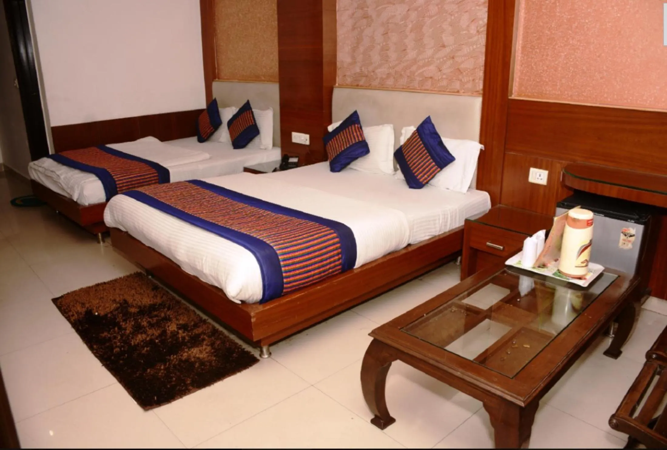 Photo of the whole room in Hotel Delhi Heart at New Delhi Railway Station