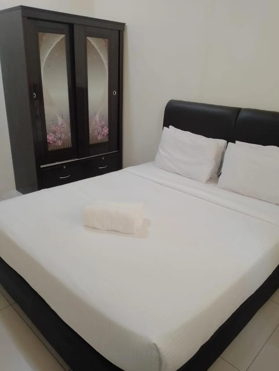 Bed in RNK BoutiQue HOTEL