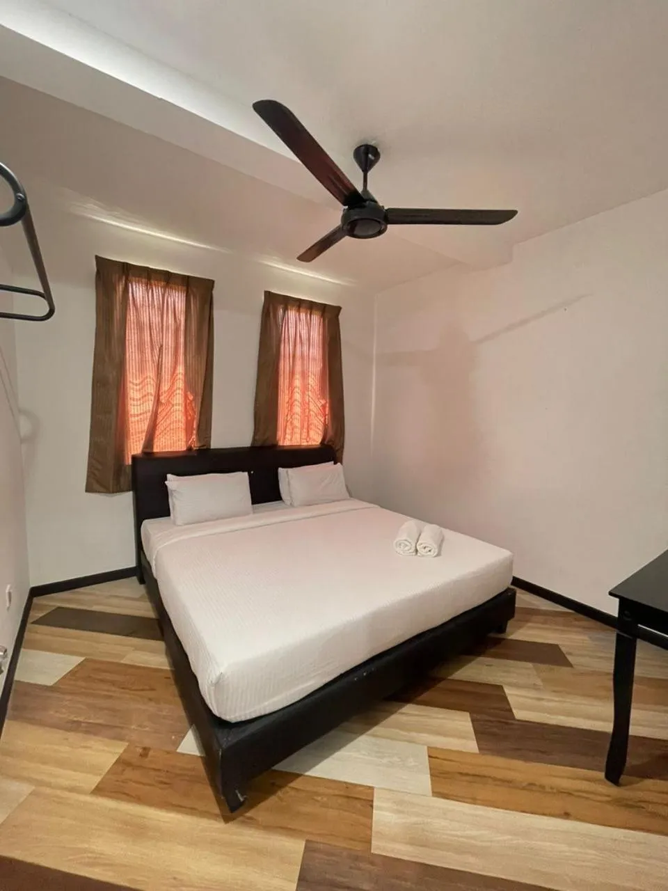 Bed in RNK BoutiQue HOTEL