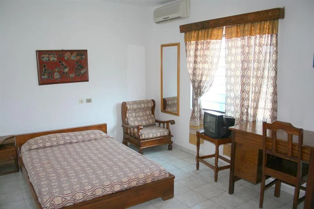 Photo of the whole room, Bed in Hotel Aurore Lomé