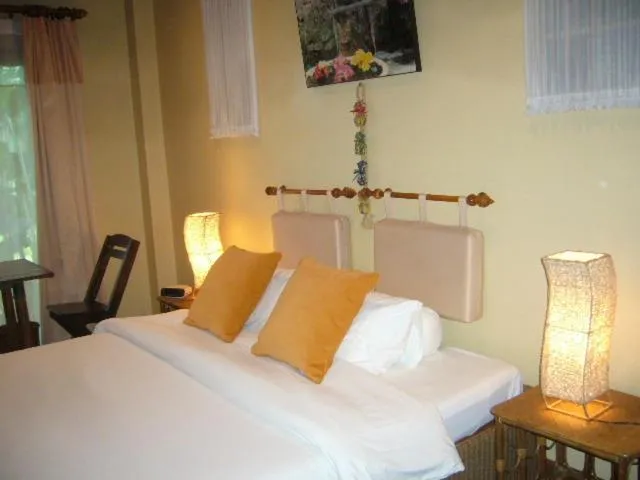 Bed in Saku Boutique Homestay