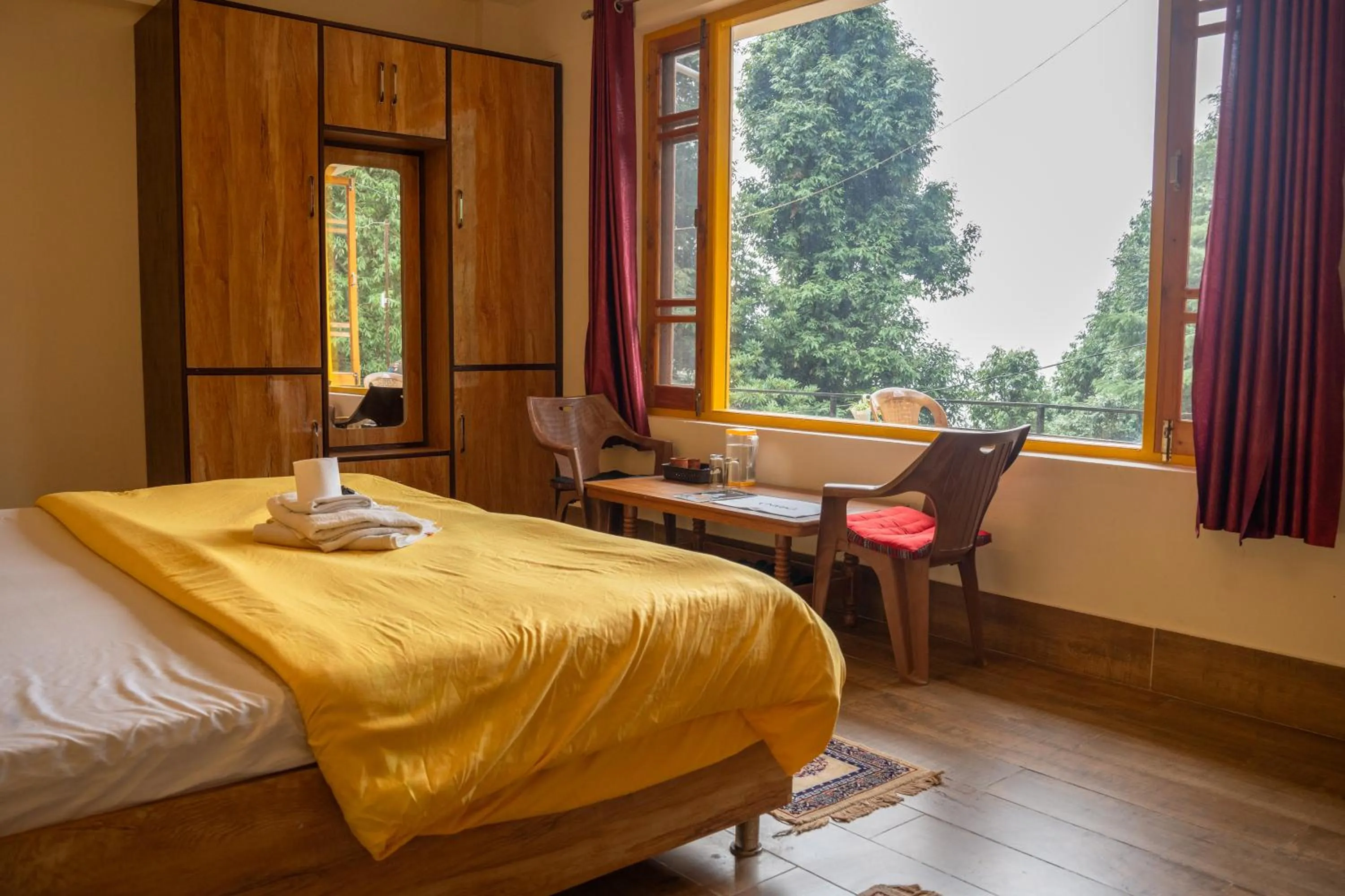 Photo of the whole room, Bed in The Unmad - Dharamkot