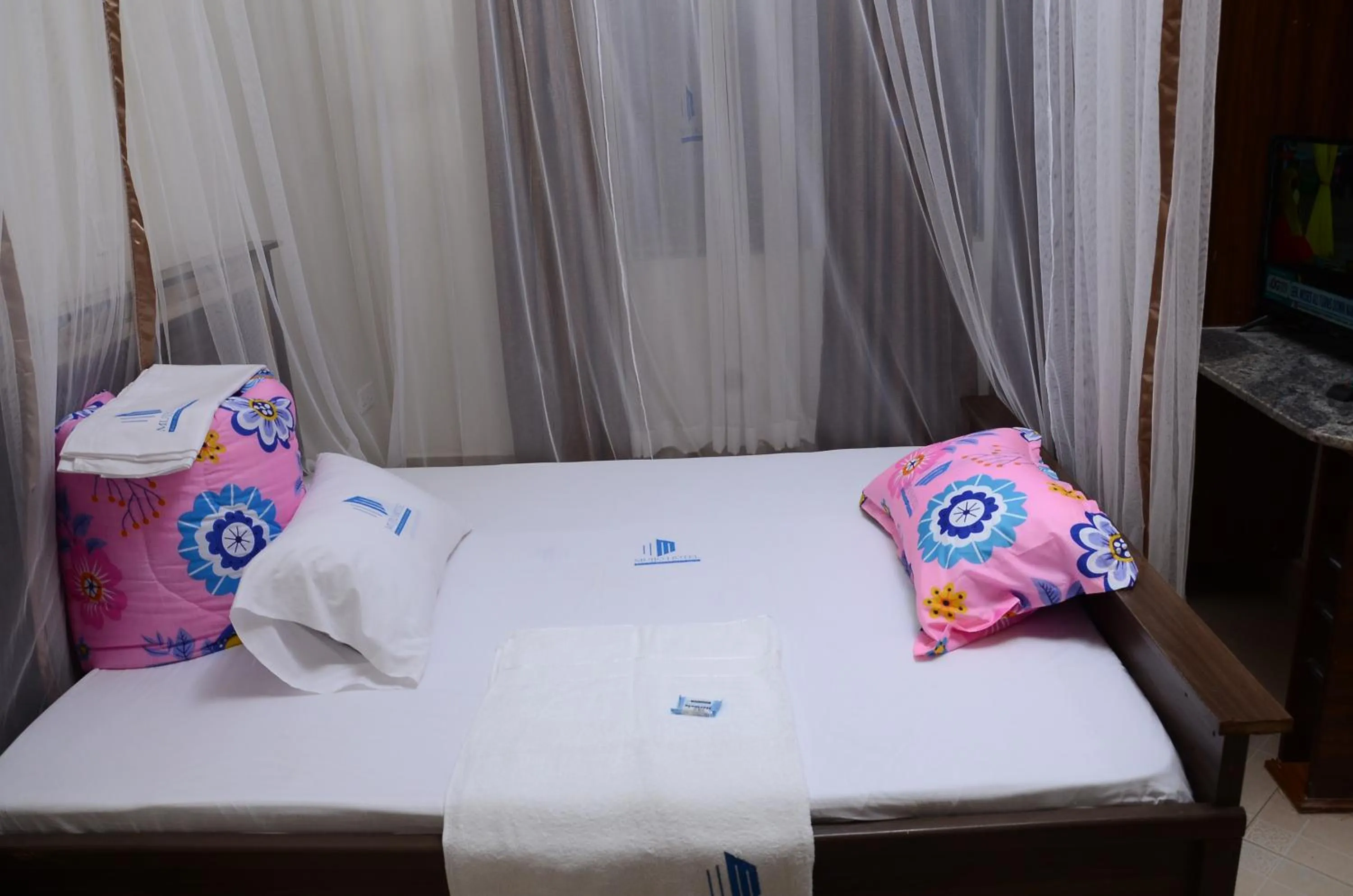 Bed in Mujjo Hotel Kajjansi