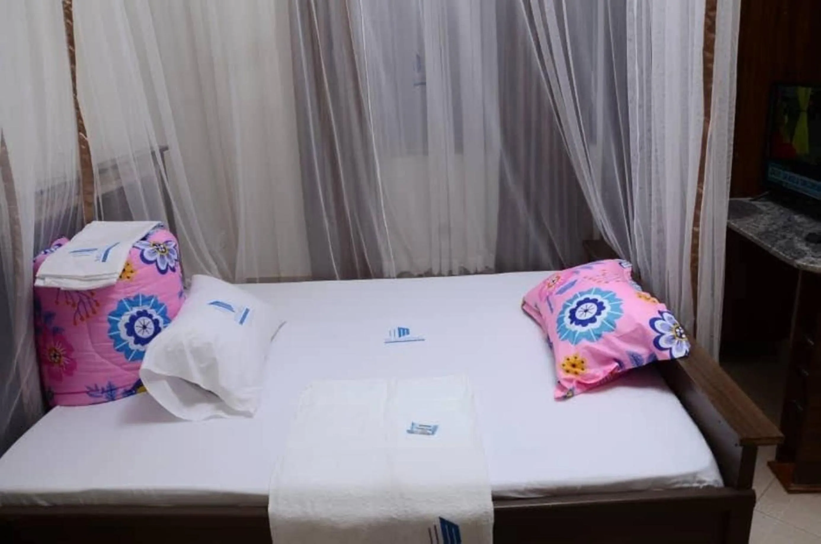 Bed in Mujjo Hotel Kajjansi