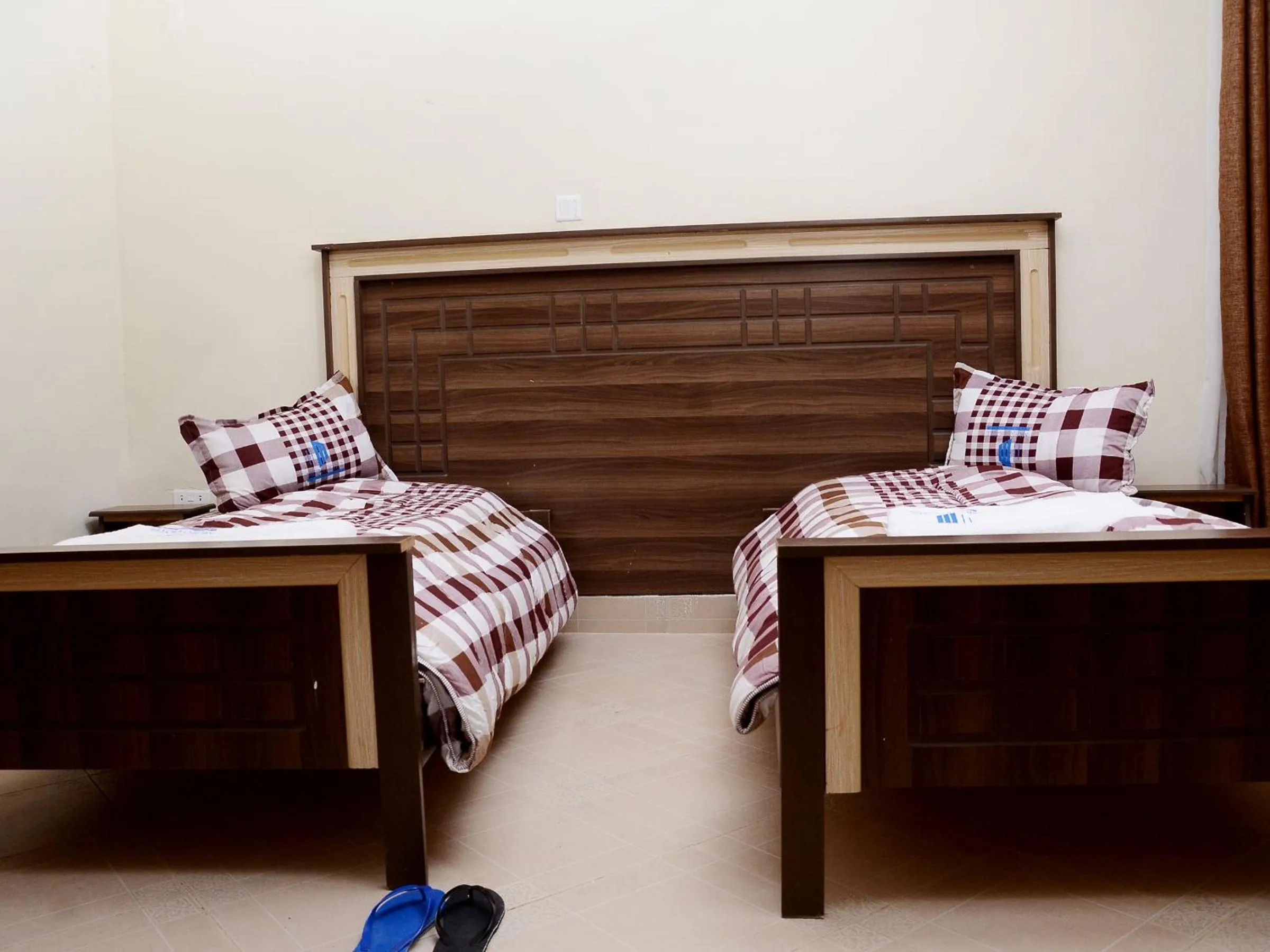 Bed in Mujjo Hotel Kajjansi