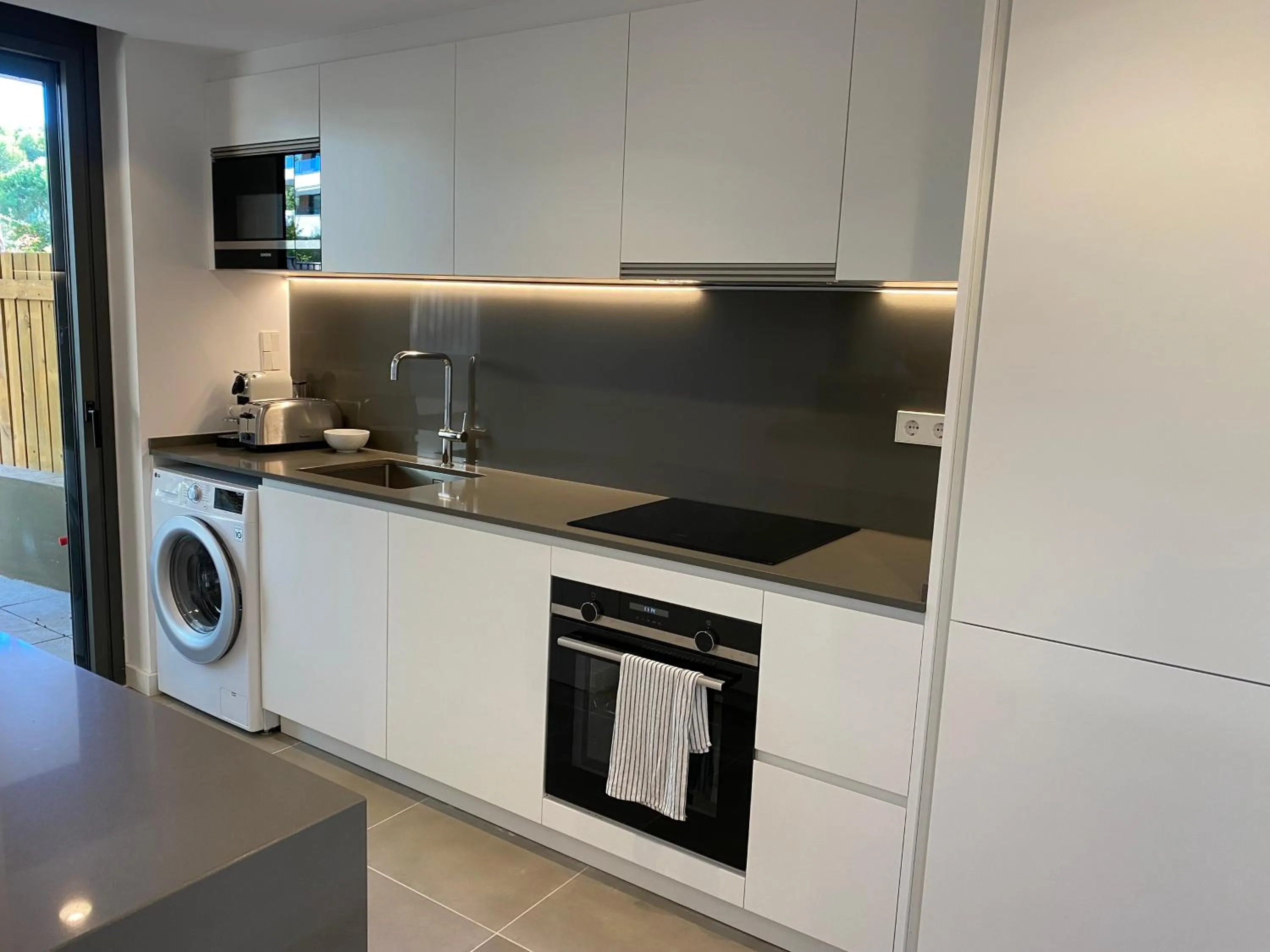 Kitchen or kitchenette in Apartamento nuevo, equipado y decorado con estilo