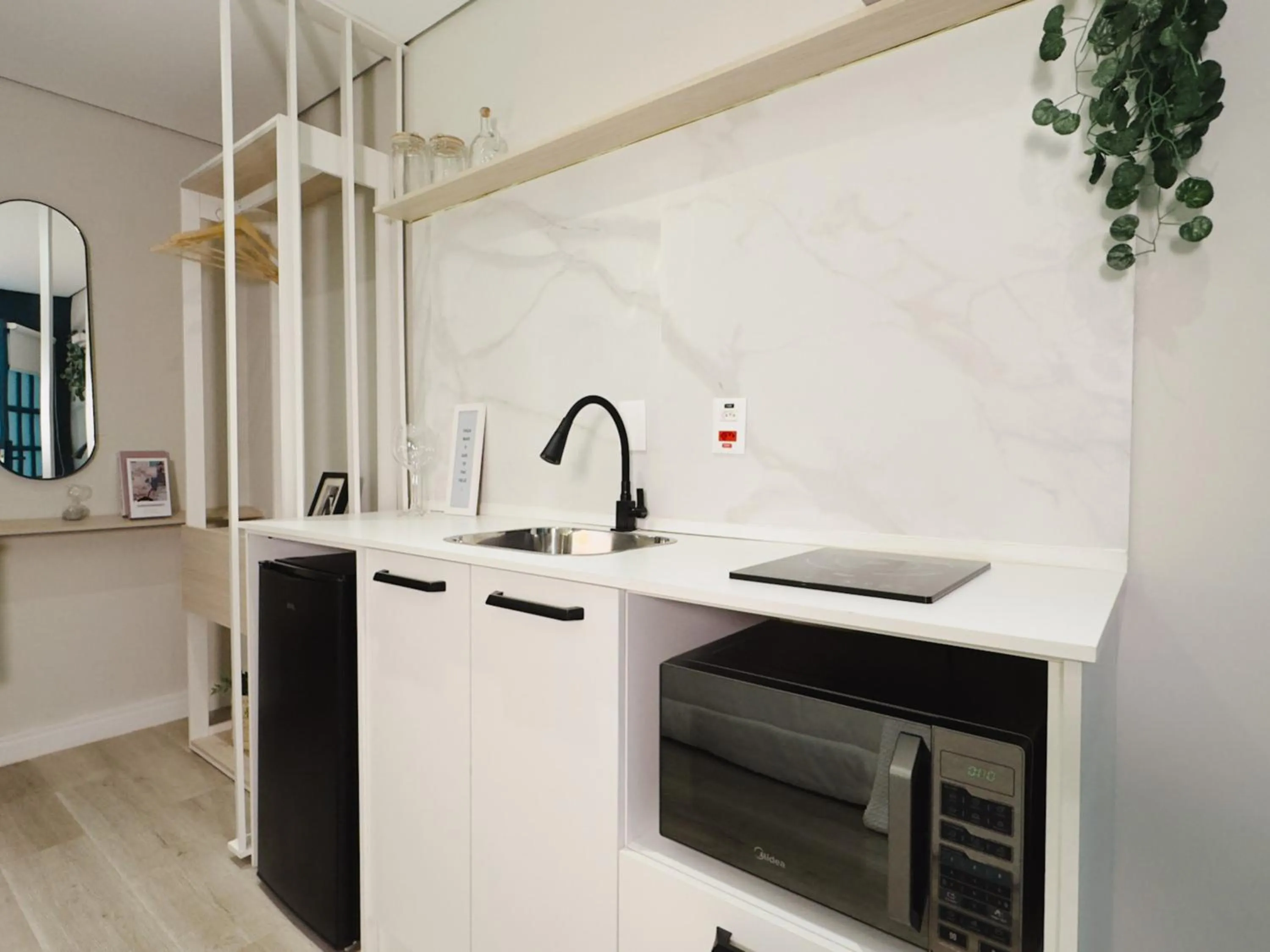 Kitchen or kitchenette in Apê Paulista Alameda Santos