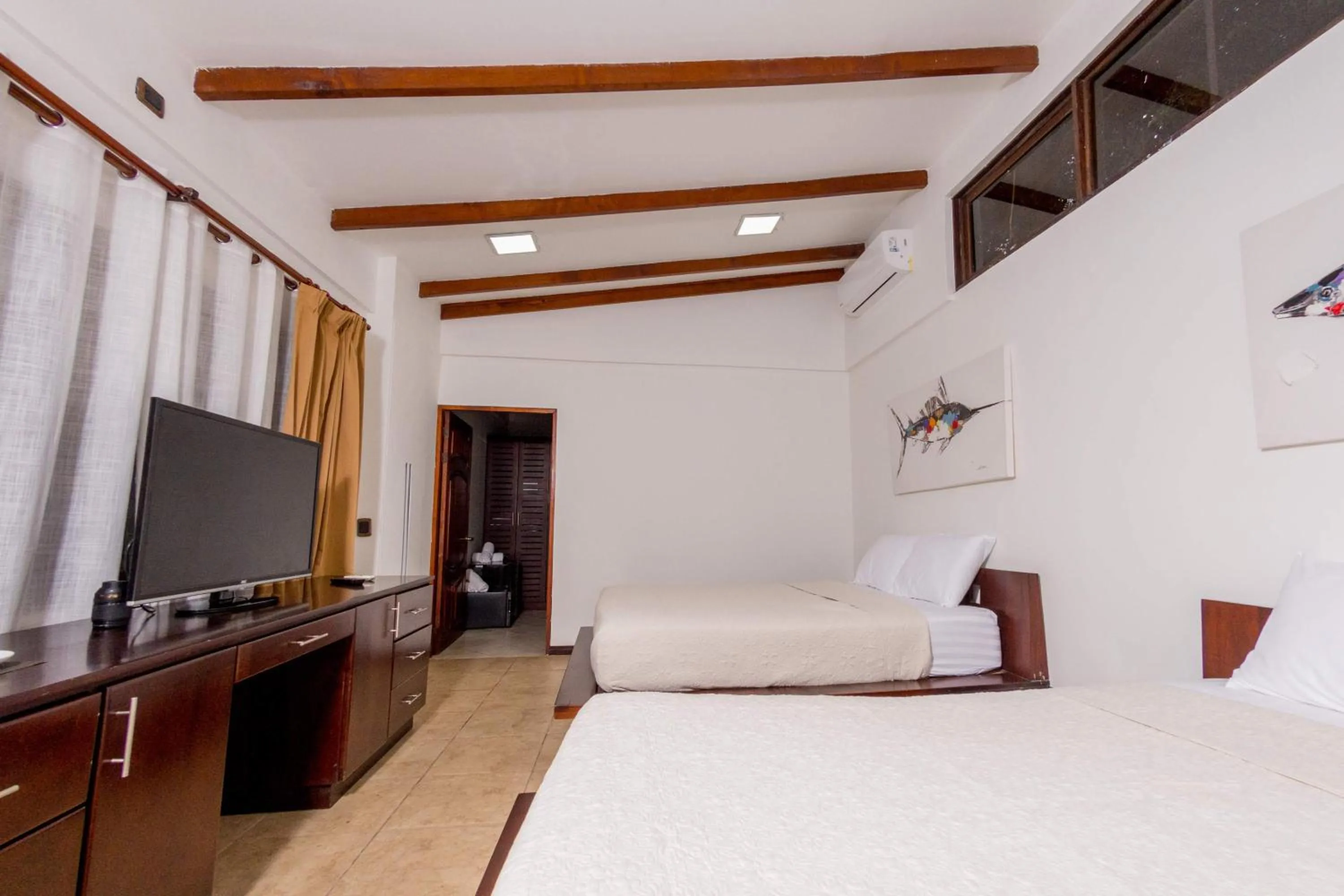 TV and multimedia, Bed in Café de Playa Beach Front Hotel