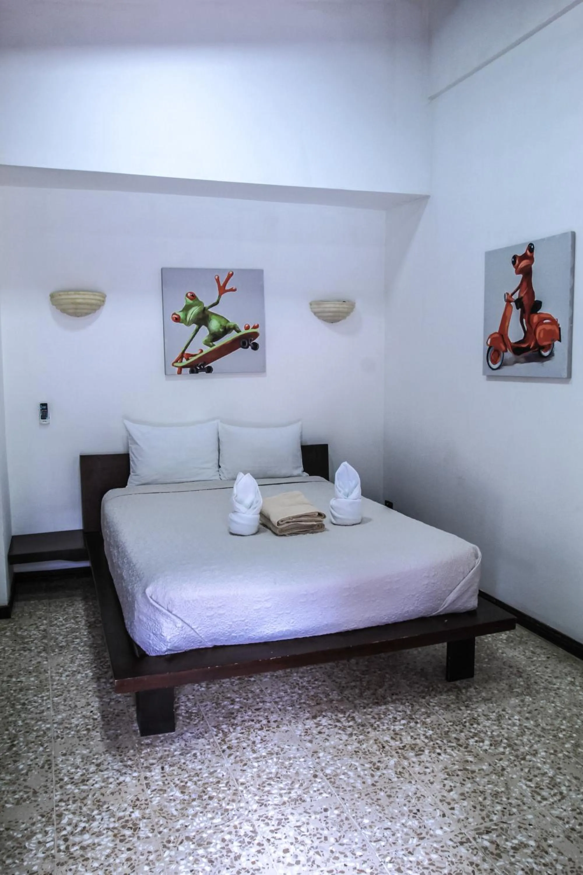 Property building, Bed in Café de Playa Beach Front Hotel