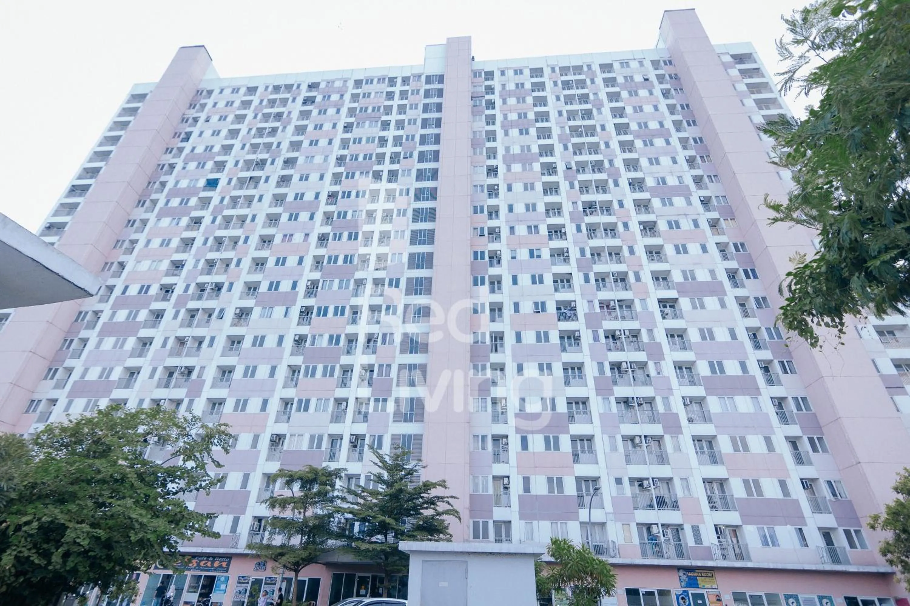 Property building in Redliving Apartemen Grand Sentraland - AT Properti Tower Pink