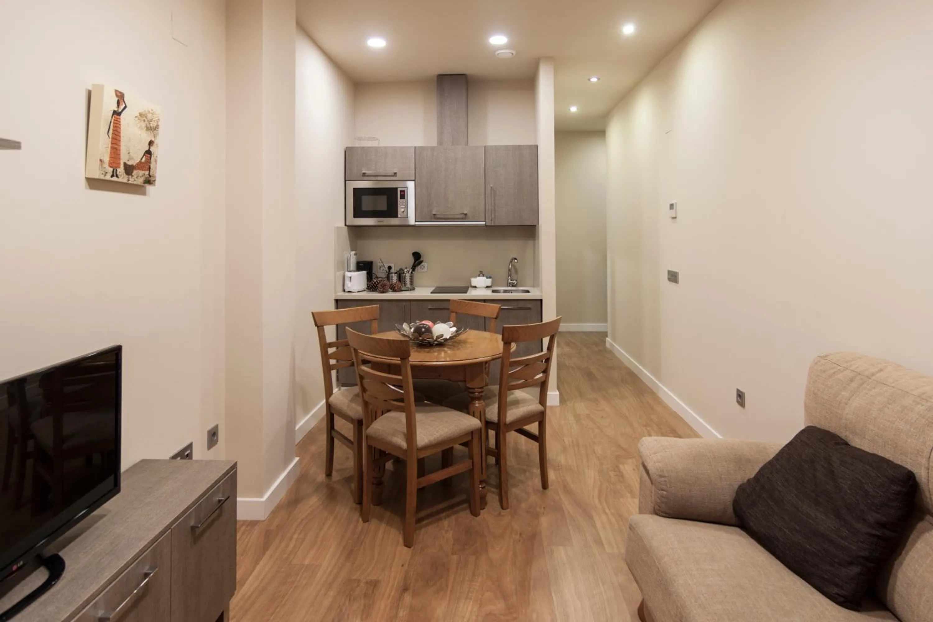 Kitchen or kitchenette in SEVITUR Seville Comfort Apartments