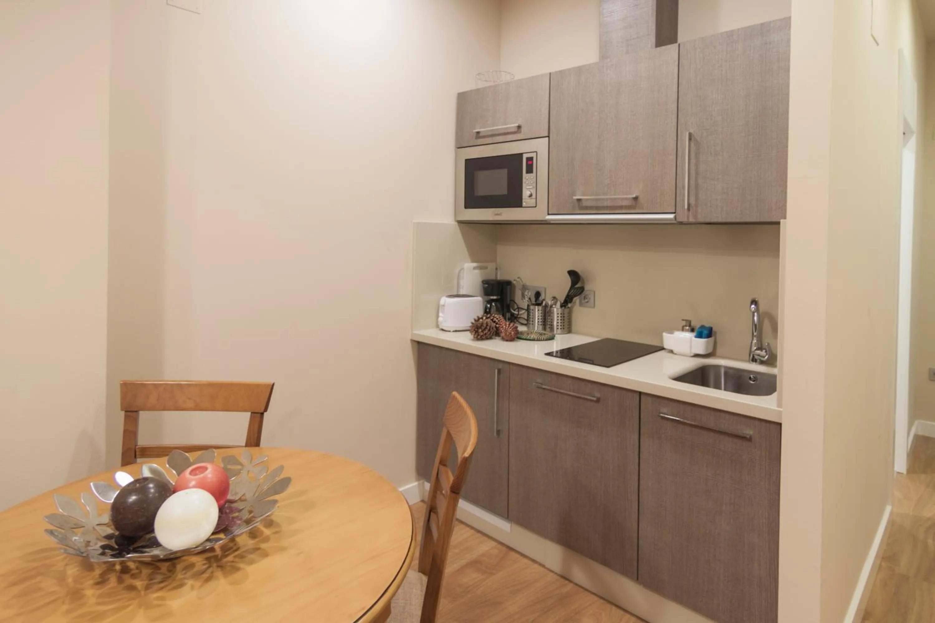 Kitchen or kitchenette in SEVITUR Seville Comfort Apartments