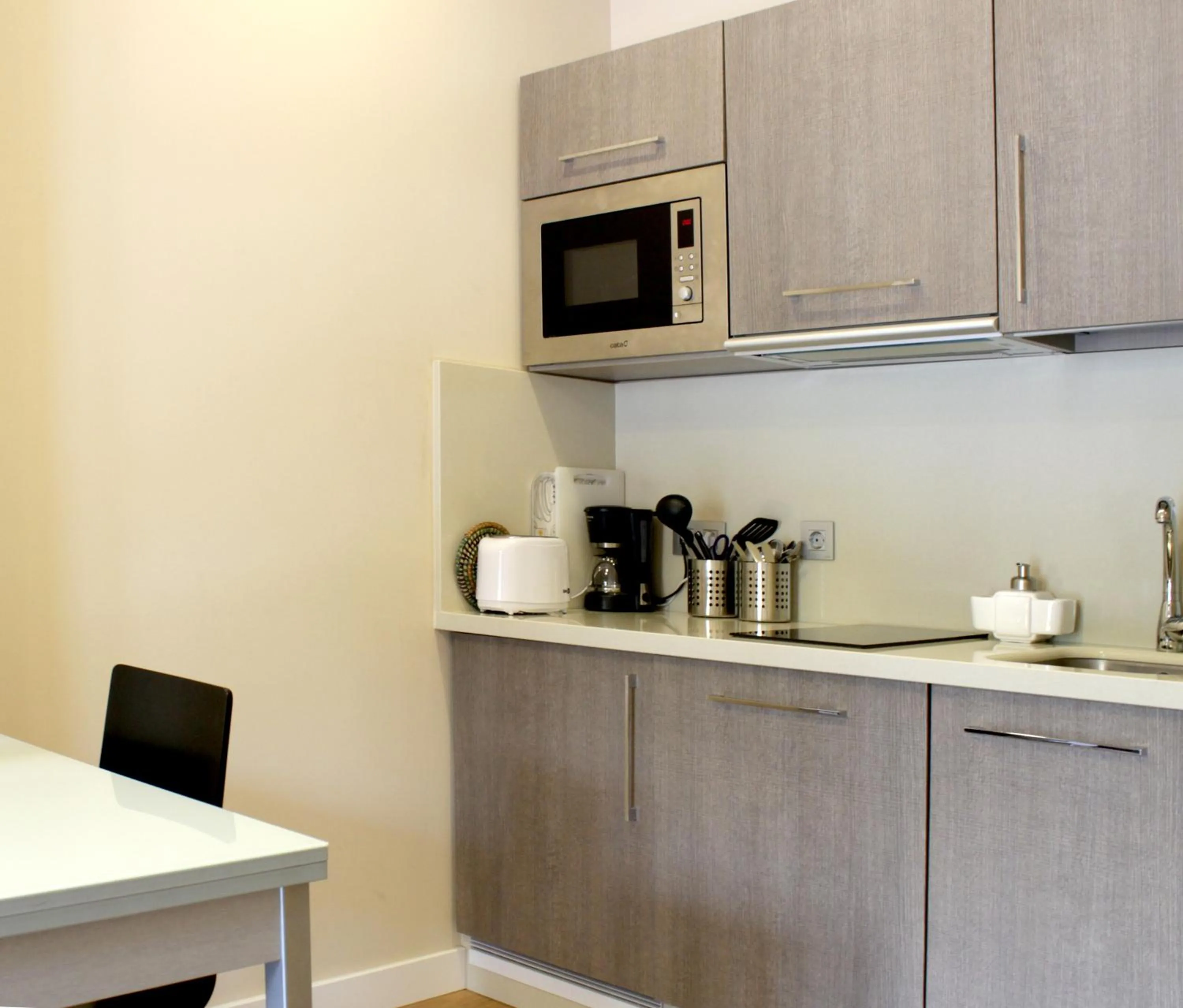 Kitchen or kitchenette in SEVITUR Seville Comfort Apartments