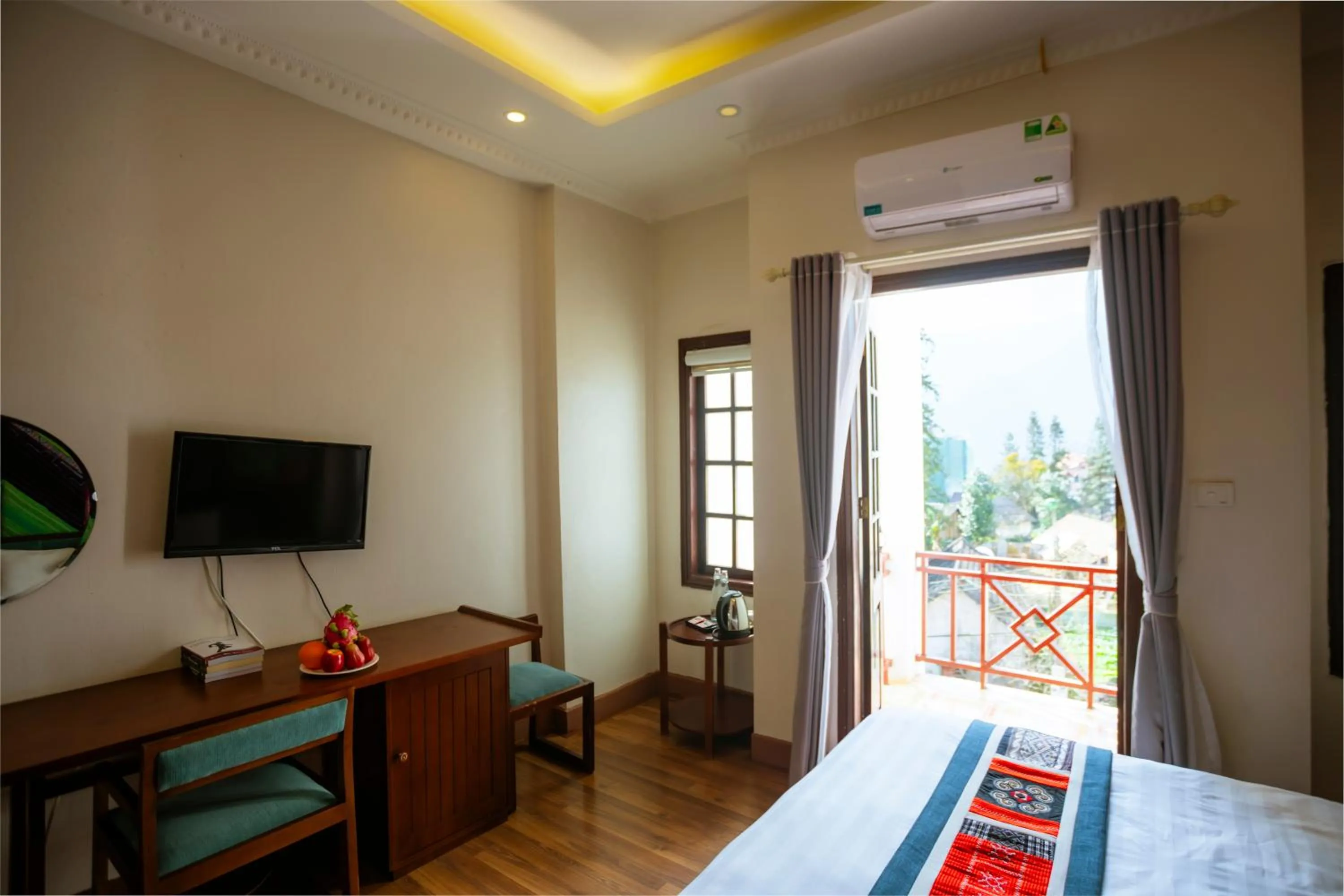 Communal lounge/ TV room, Bed in Le Boutique Sapa Hotel