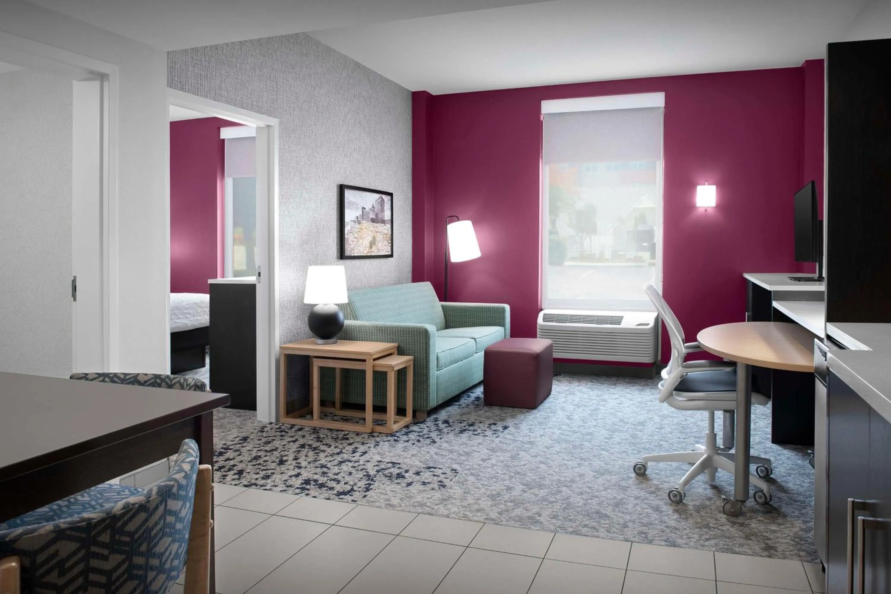 Living room in Home2 Suites by Hilton Greensboro Airport, NC