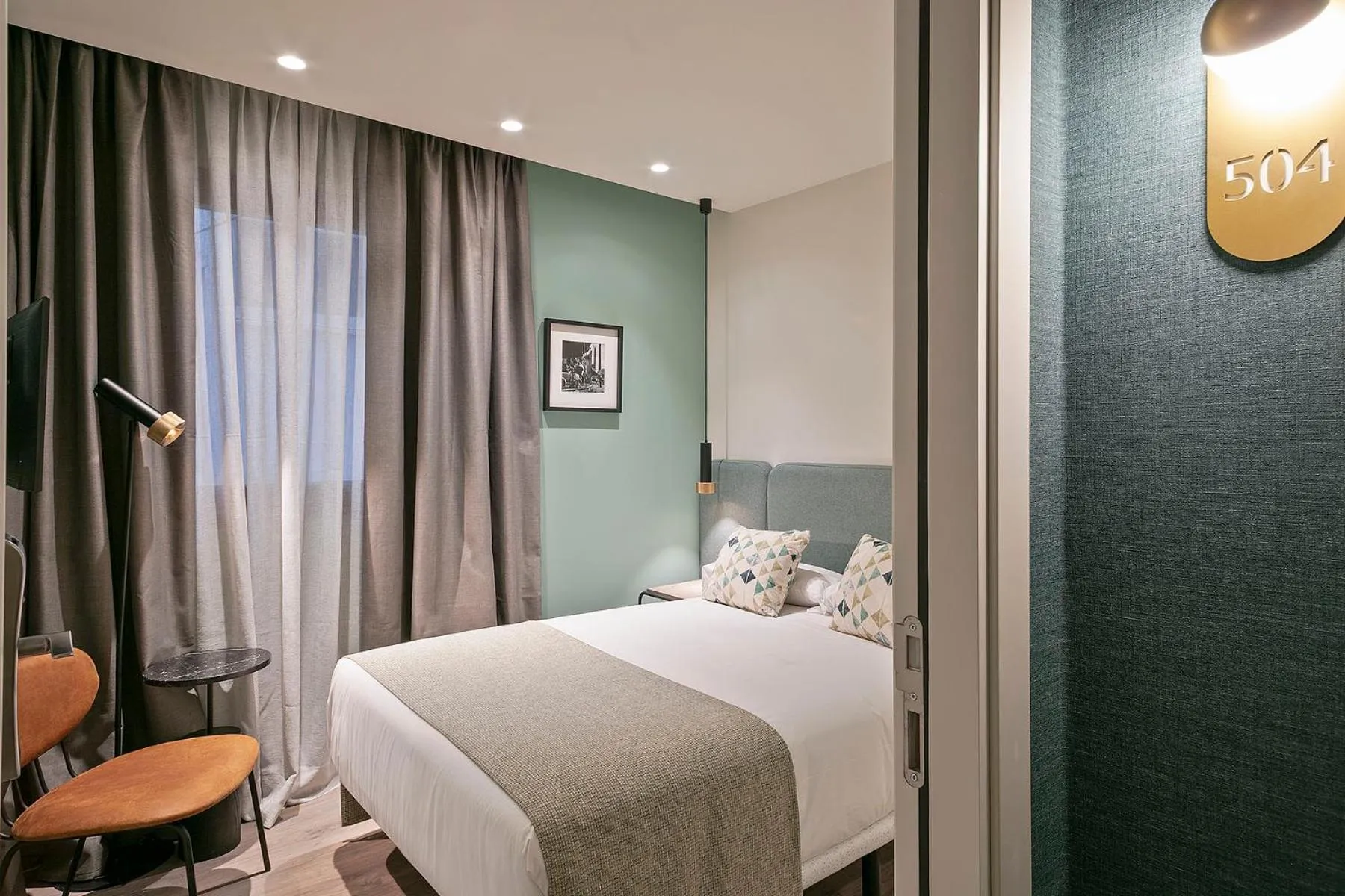 Bed in Hotel Via Augusta