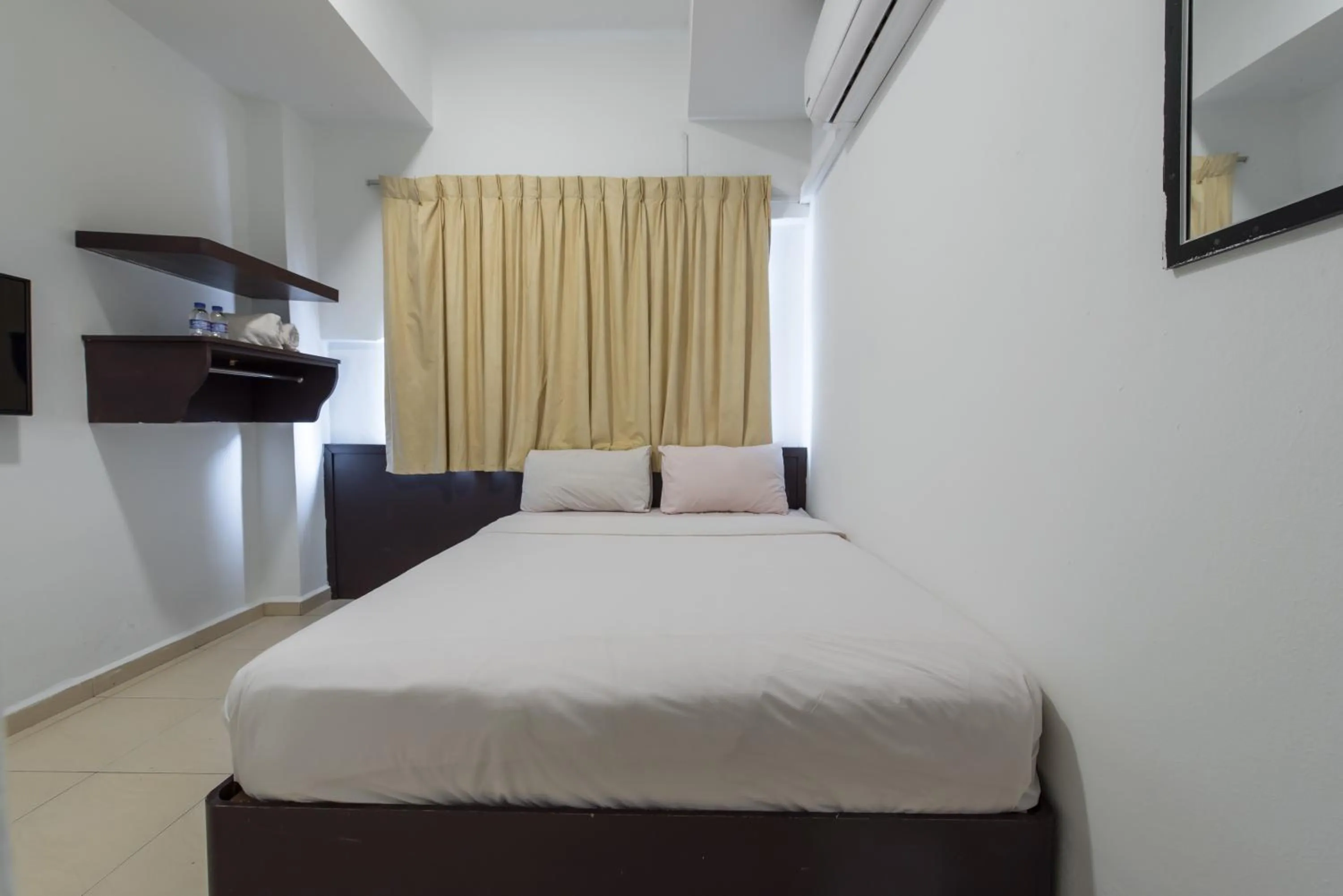 Bed in Hollitel Hotel Melaka