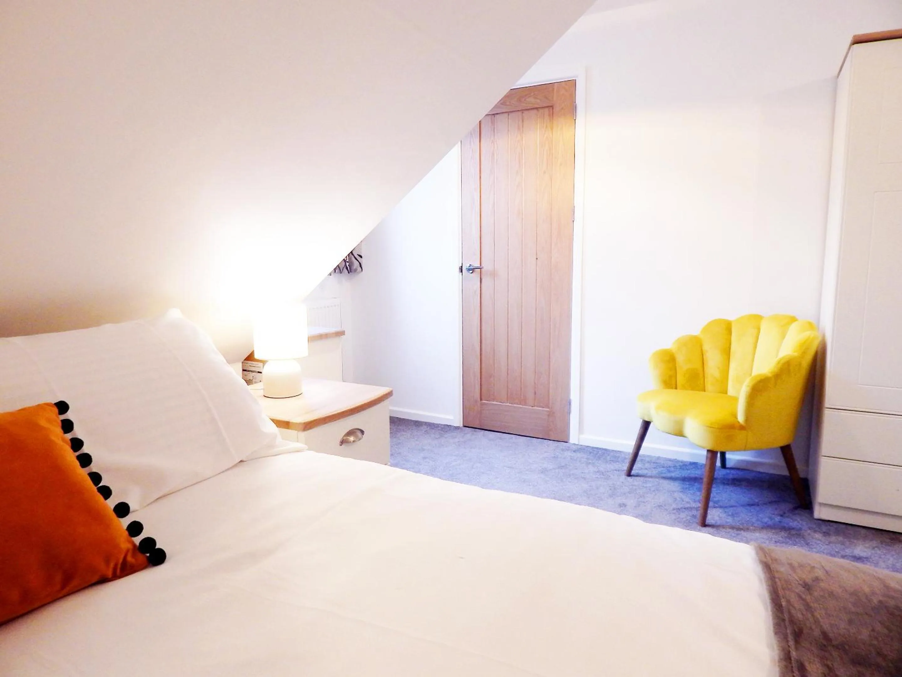 Seating area, Bed in Modern, well located en-suite rooms with parking & all facilities