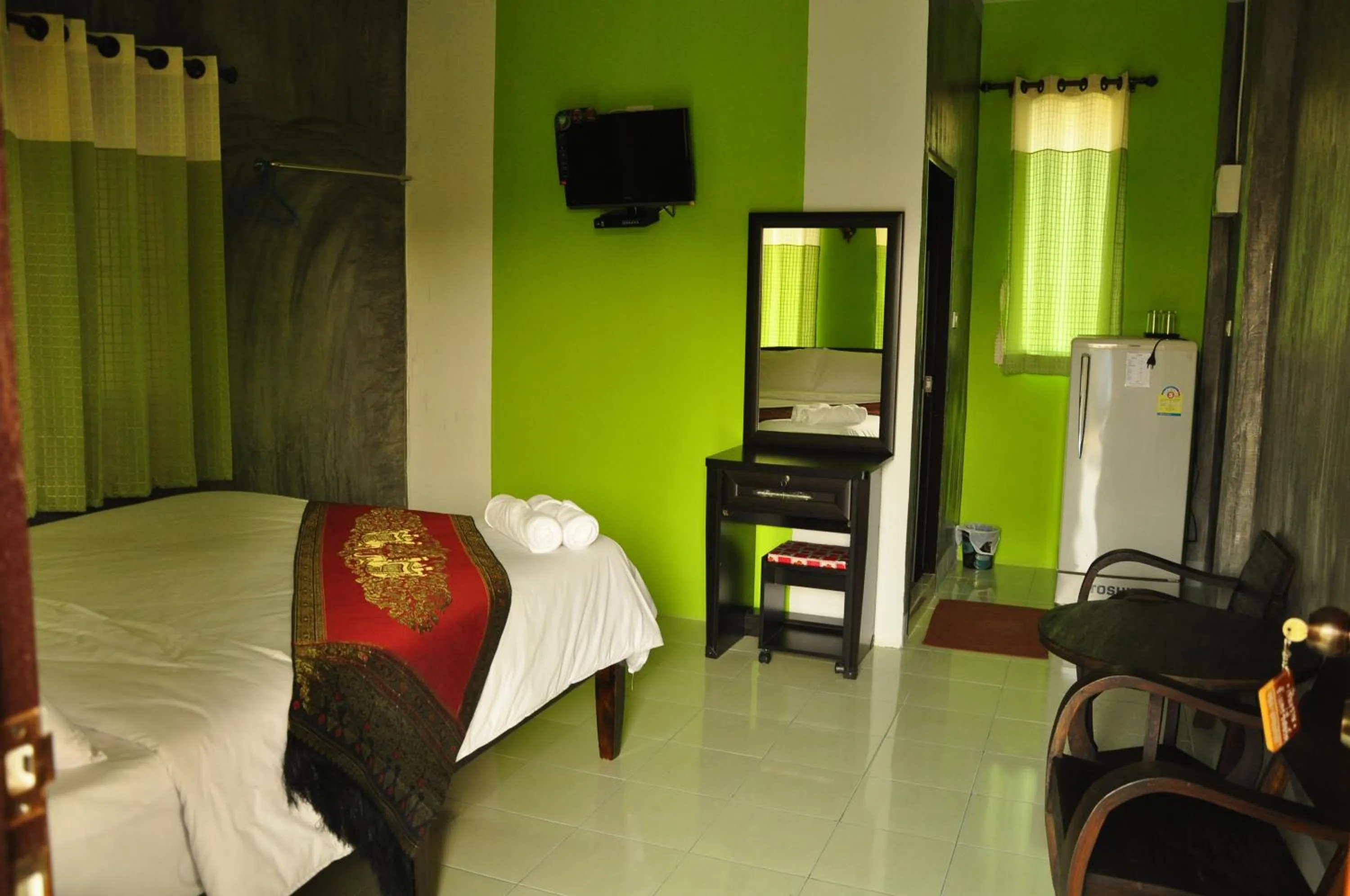 Bed in Chiang Rai Khuakrae Resort