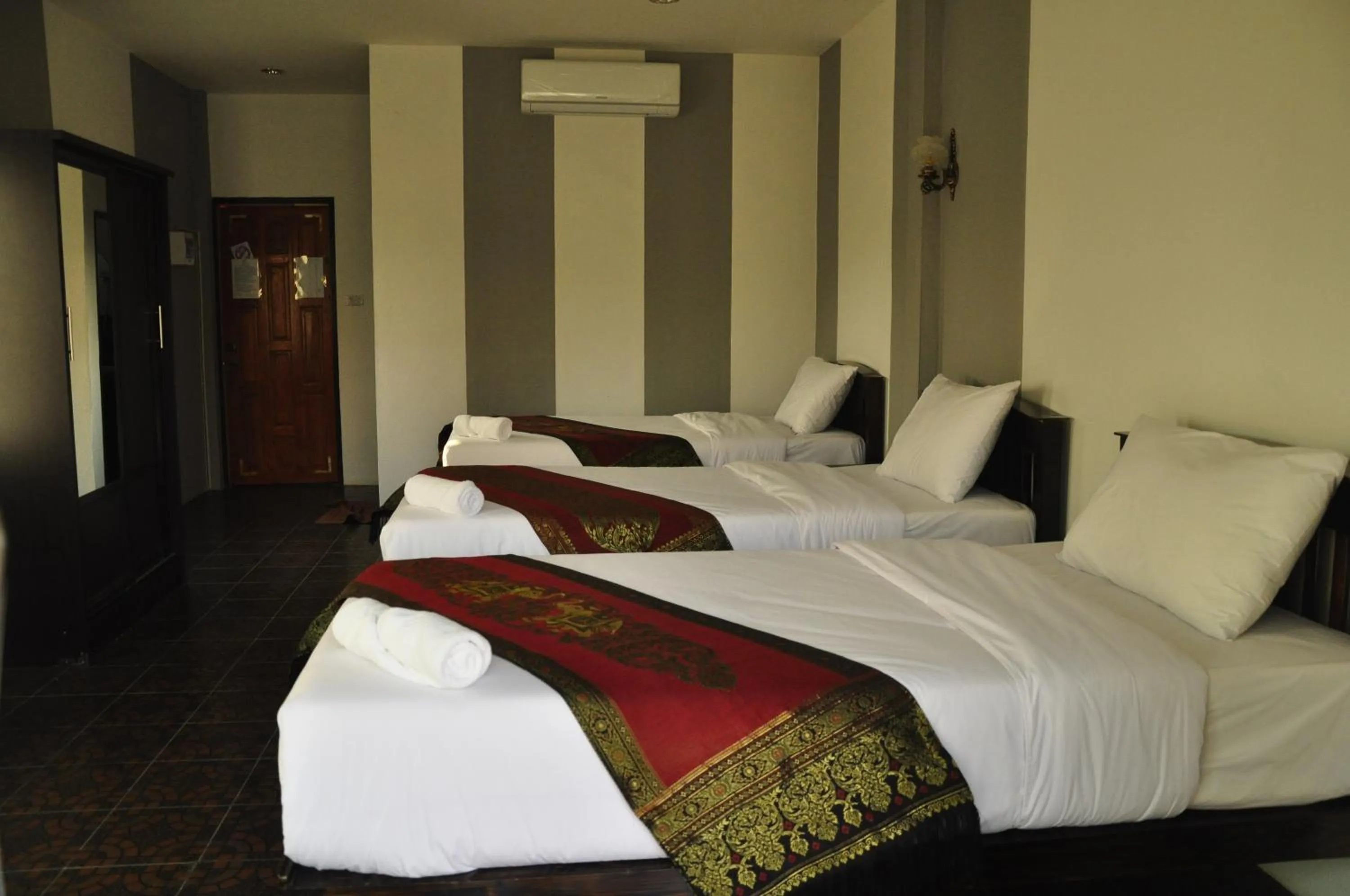 Bed in Chiang Rai Khuakrae Resort