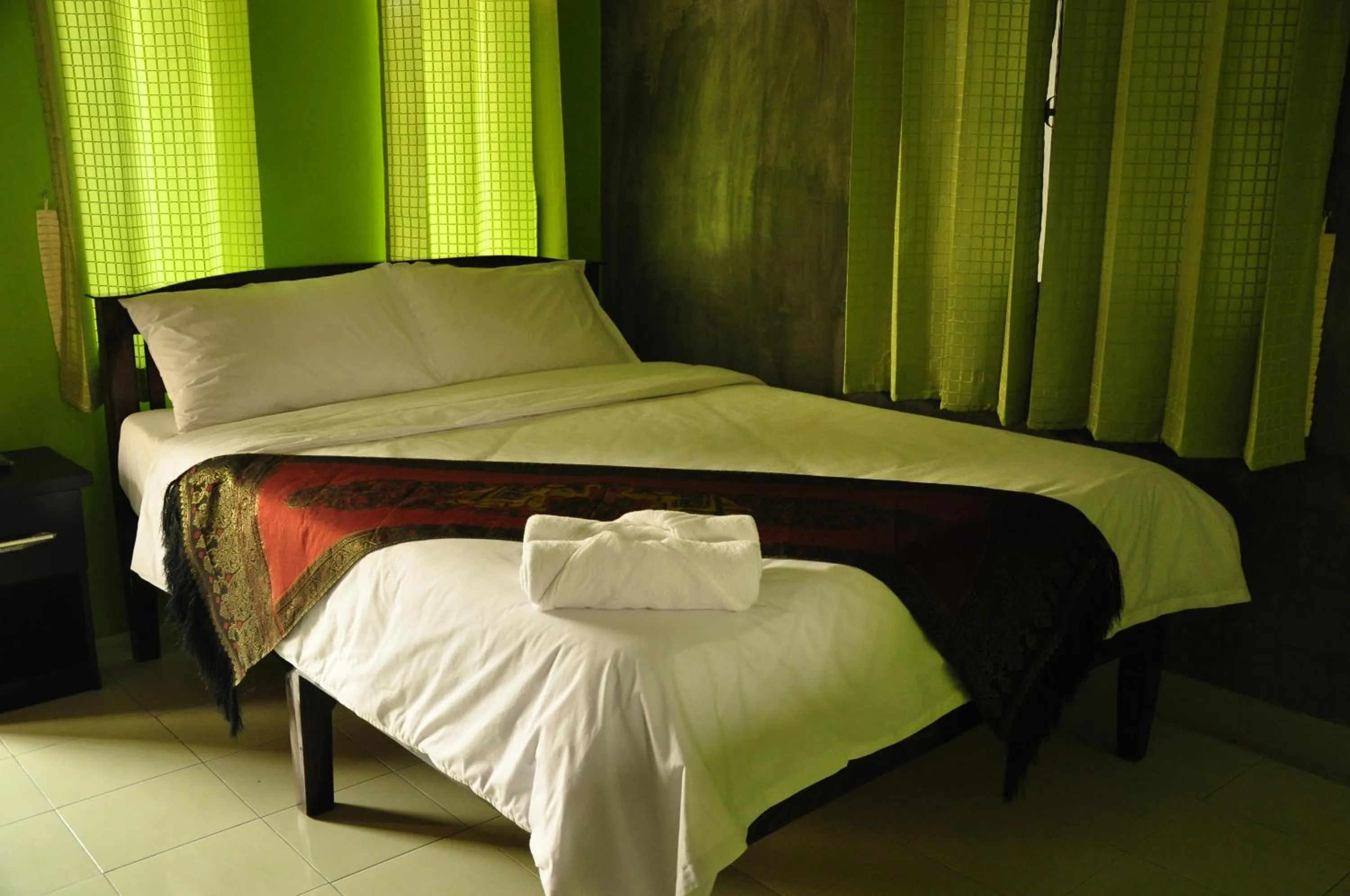 Bed in Chiang Rai Khuakrae Resort