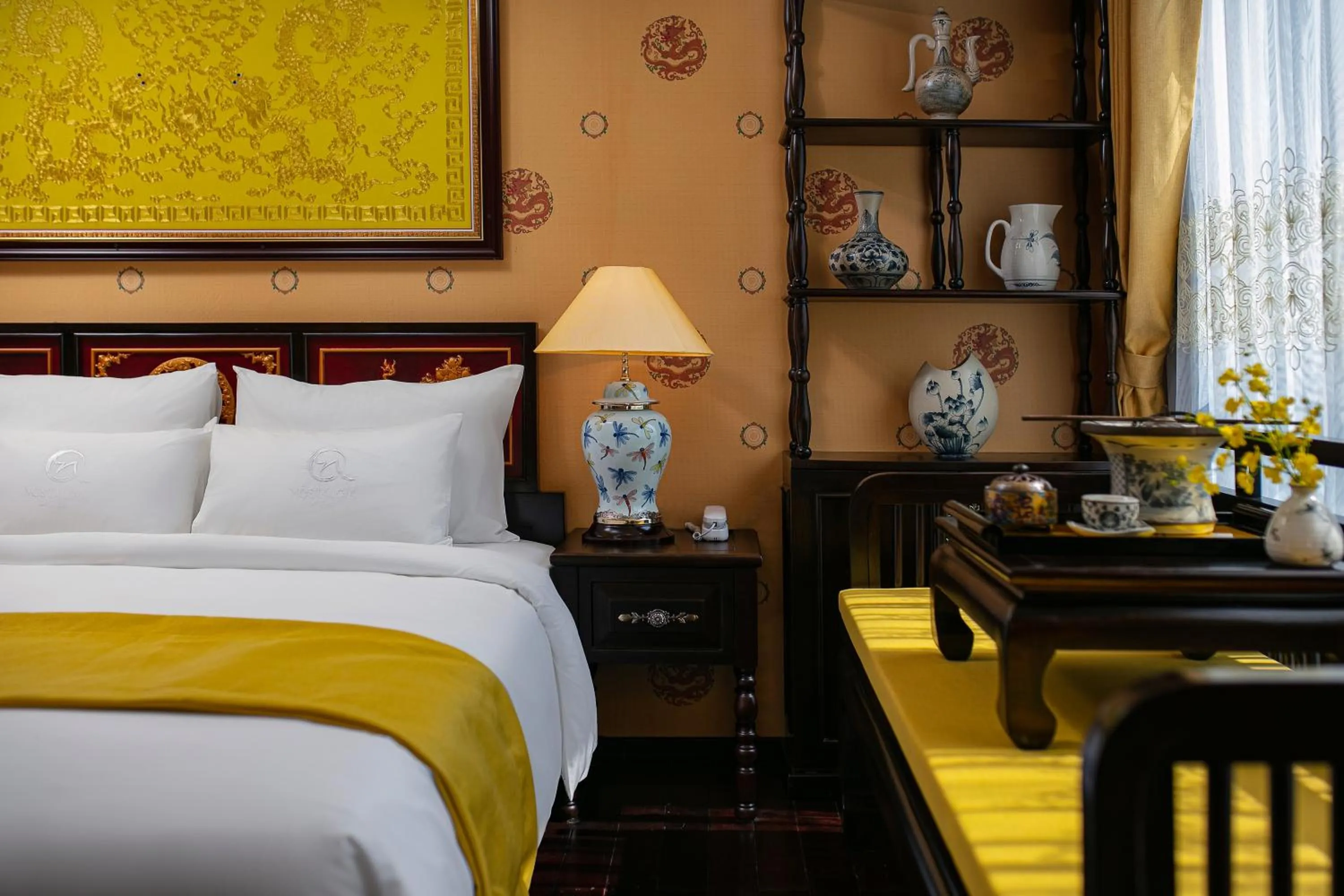 Seating area, Bed in Nostalgia Halong Cruise