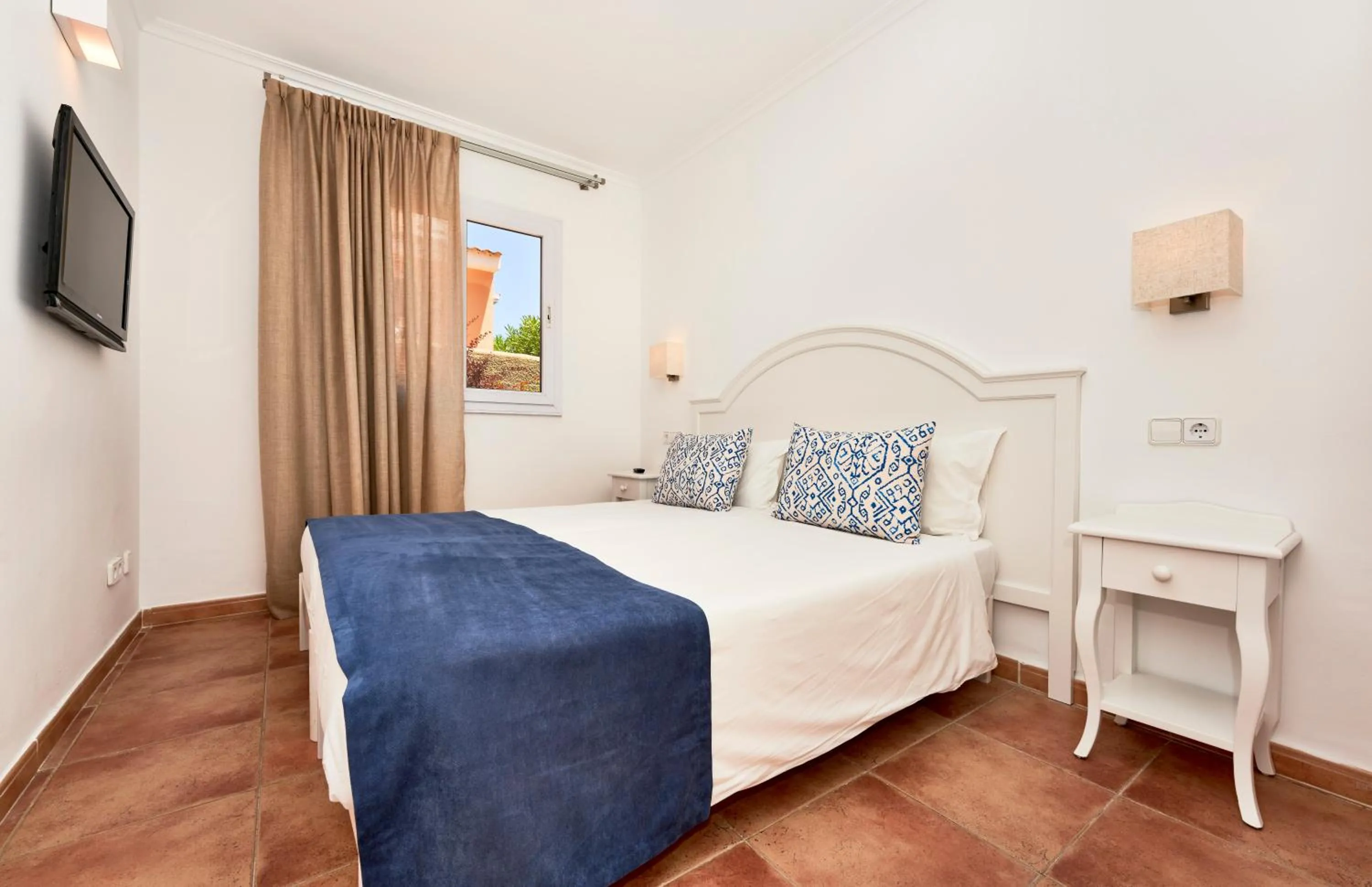 Bedroom in Insotel Cala Mandia Resort