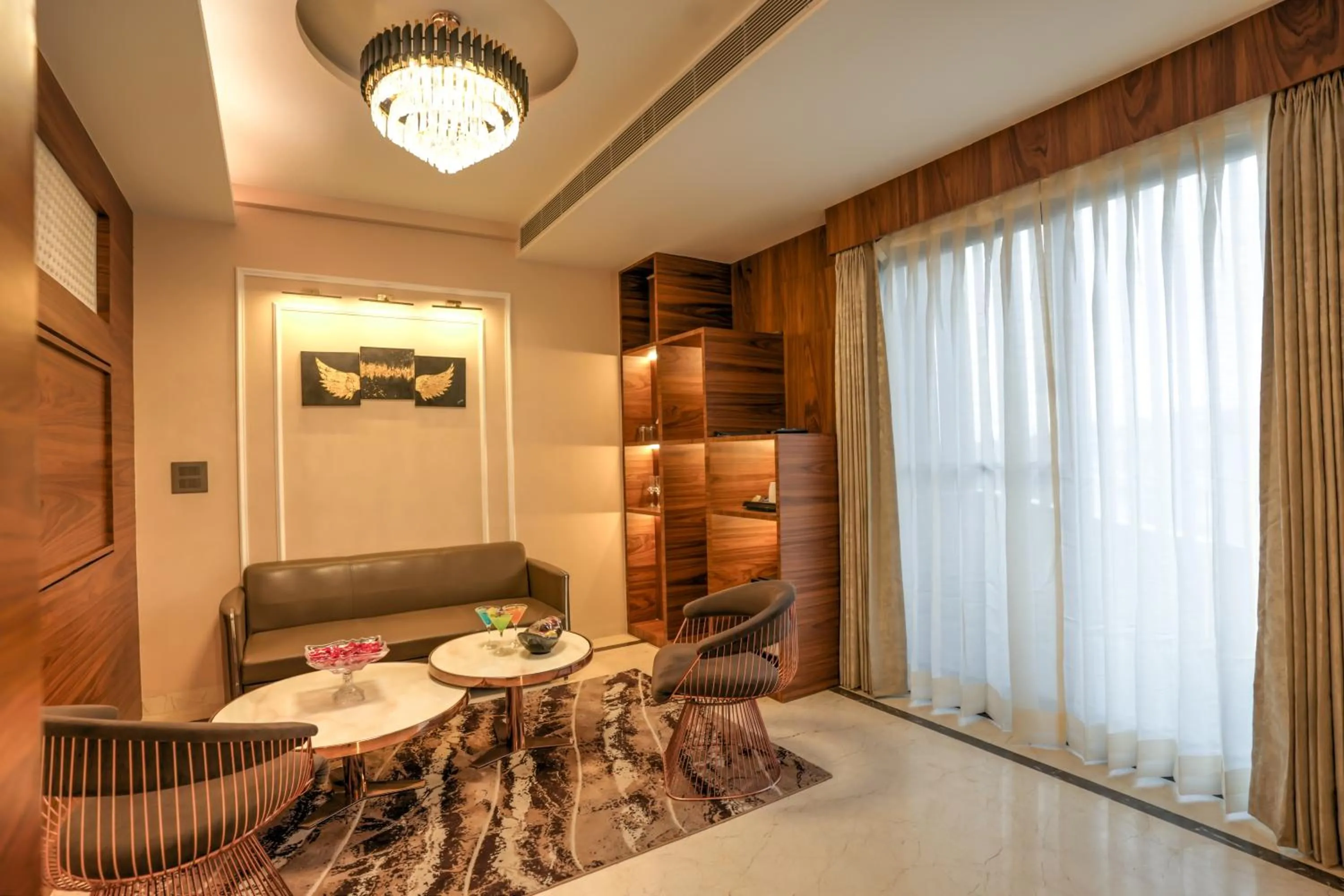 Living room, Bed in Hotel Rj