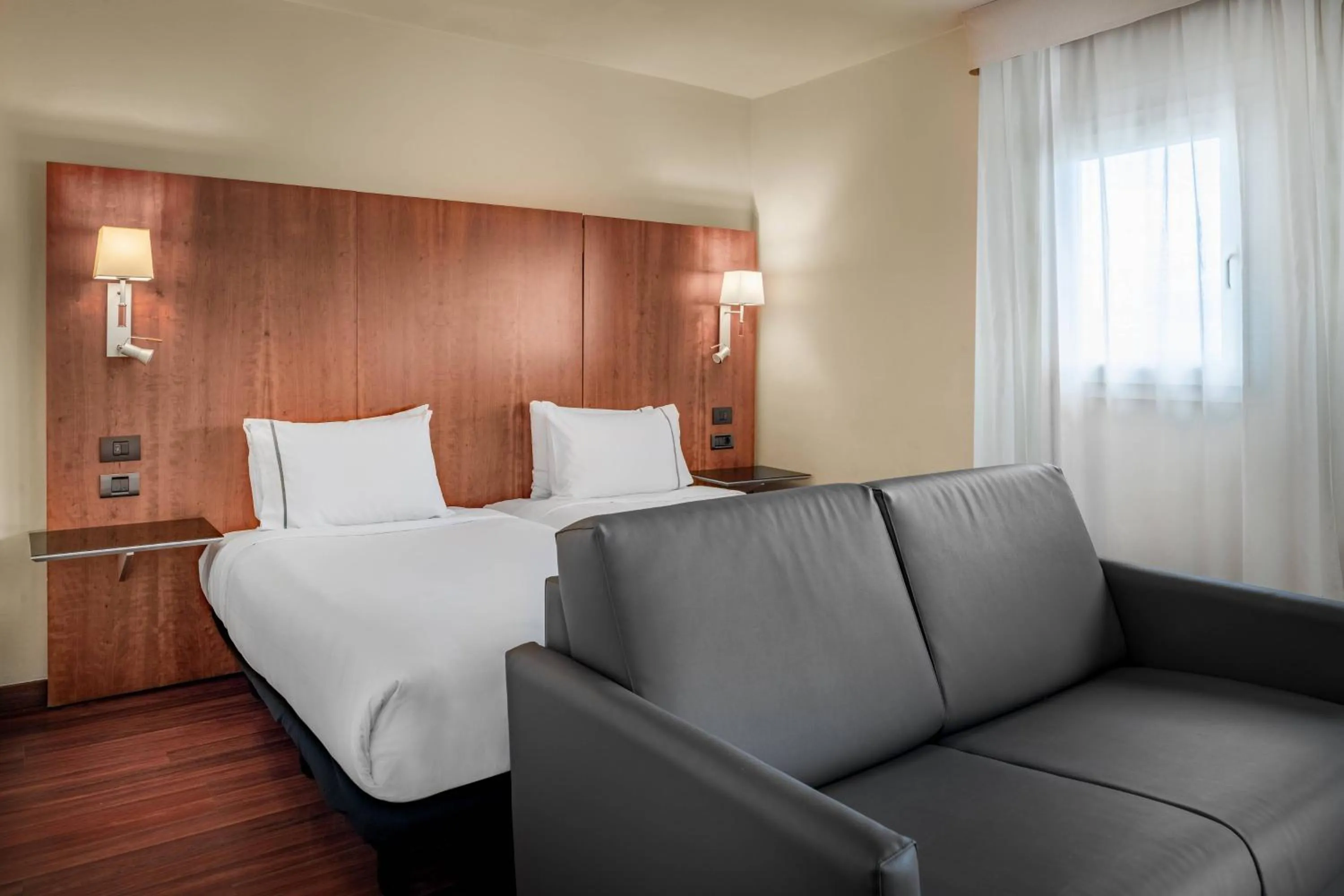 Photo of the whole room, Bed in AC Hotel La Línea by Marriott