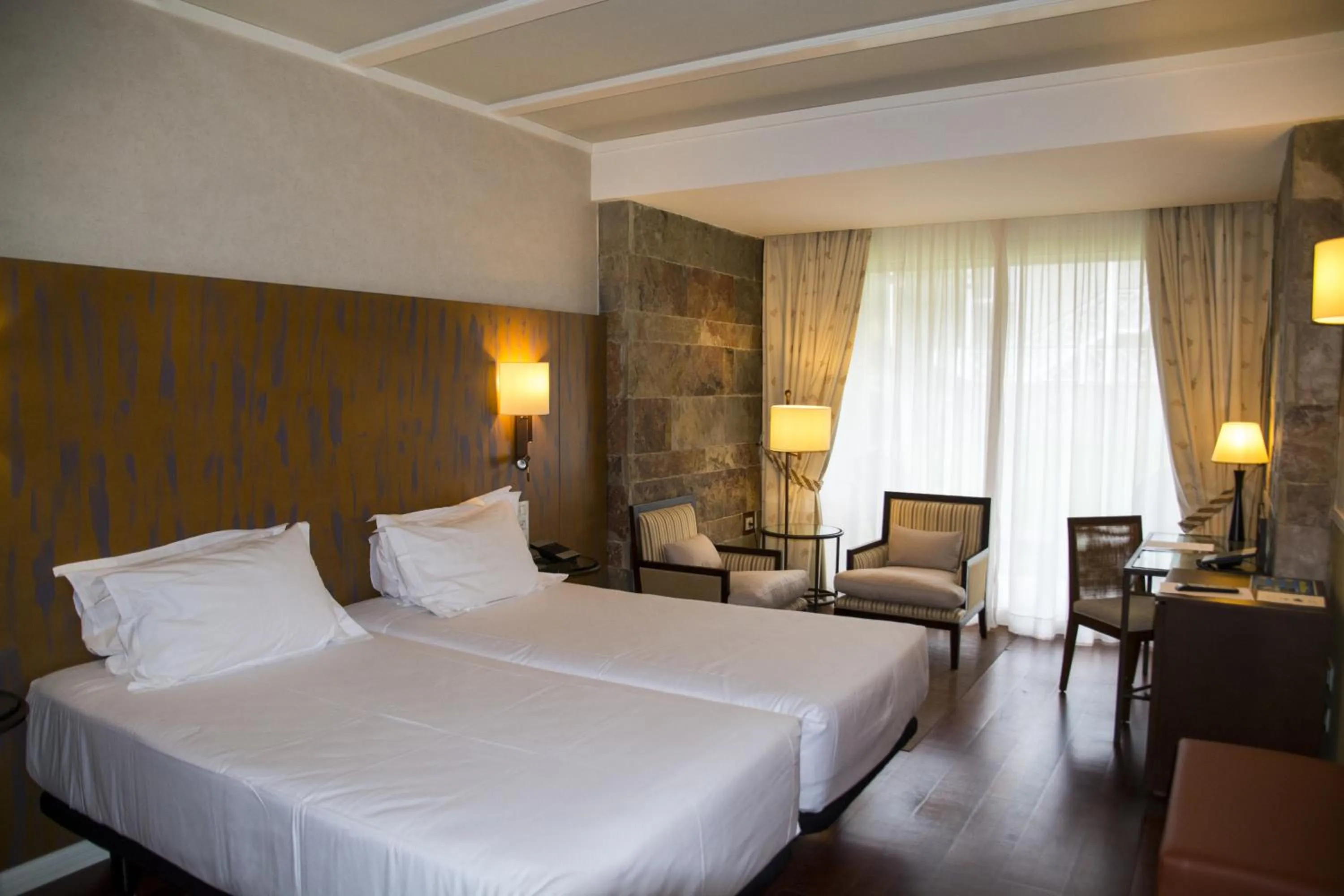 Photo of the whole room, Bed in Hotel Nuevo Portil Golf