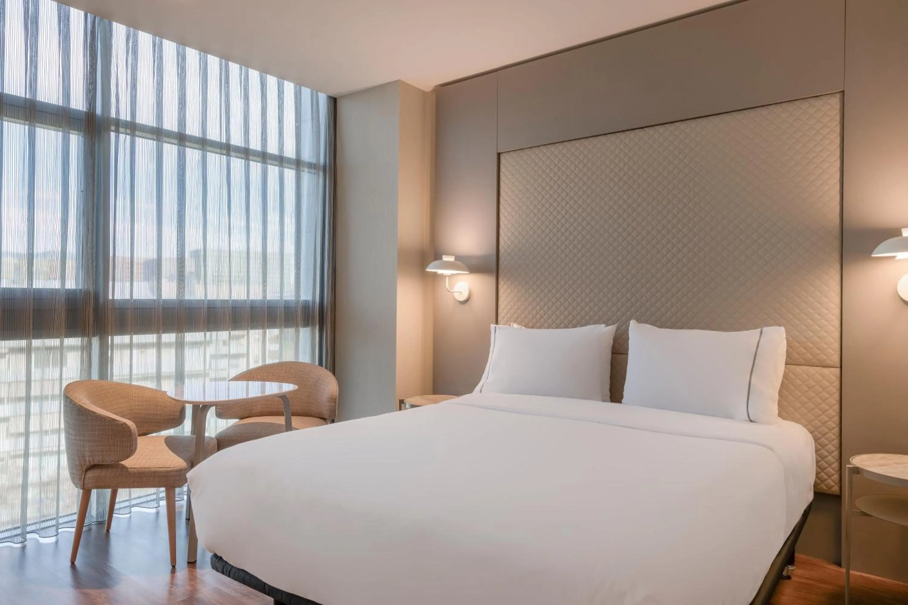 Photo of the whole room, Bed in AC Hotel Som by Marriott