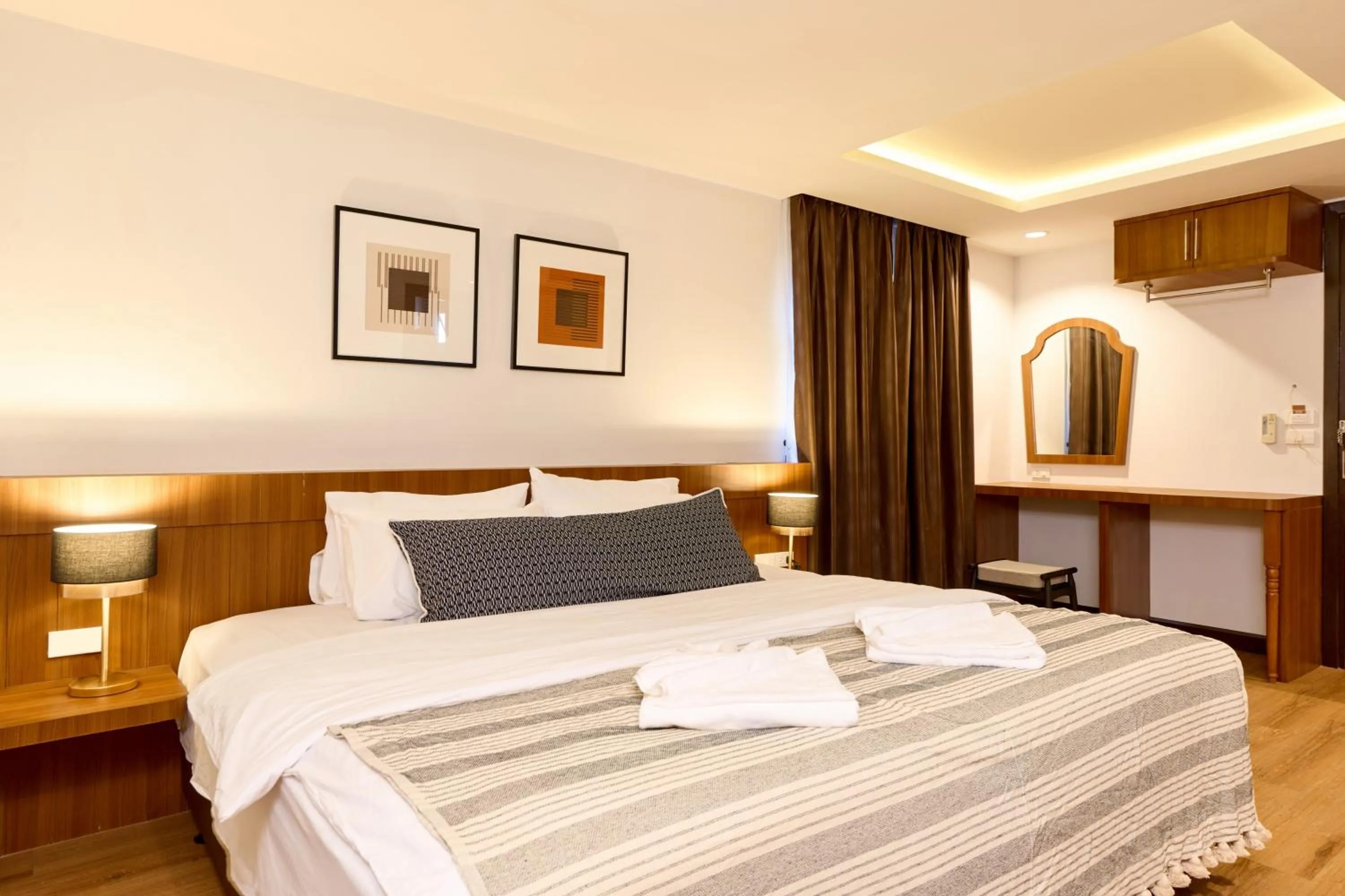 Bed in Be Phrasingh Hotel Chiang Mai