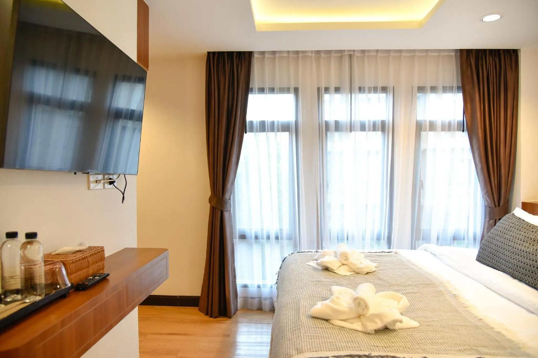 Bed in Be Phrasingh Hotel Chiang Mai