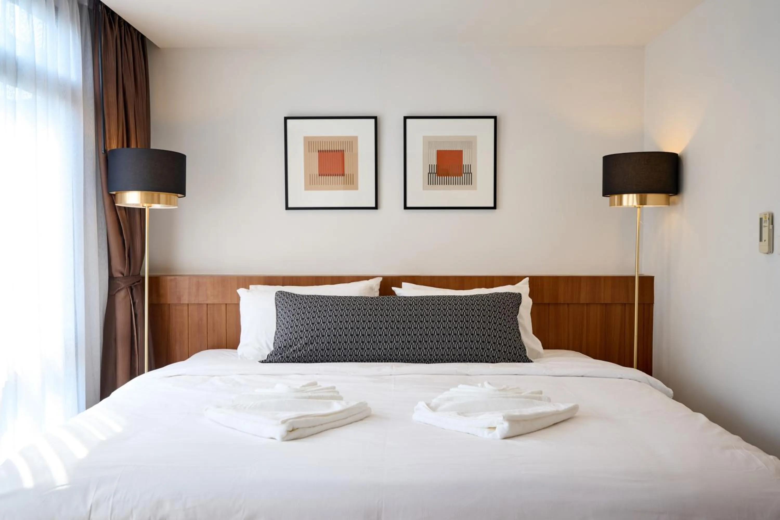 Bed in Be Phrasingh Hotel Chiang Mai