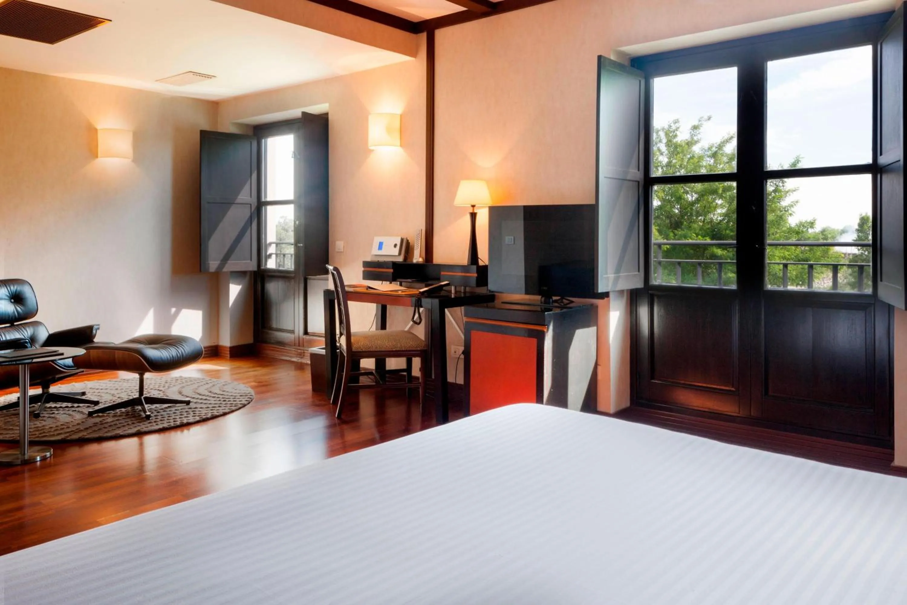 Photo of the whole room, Bed in AC Hotel Palacio de Santa Ana by Marriott