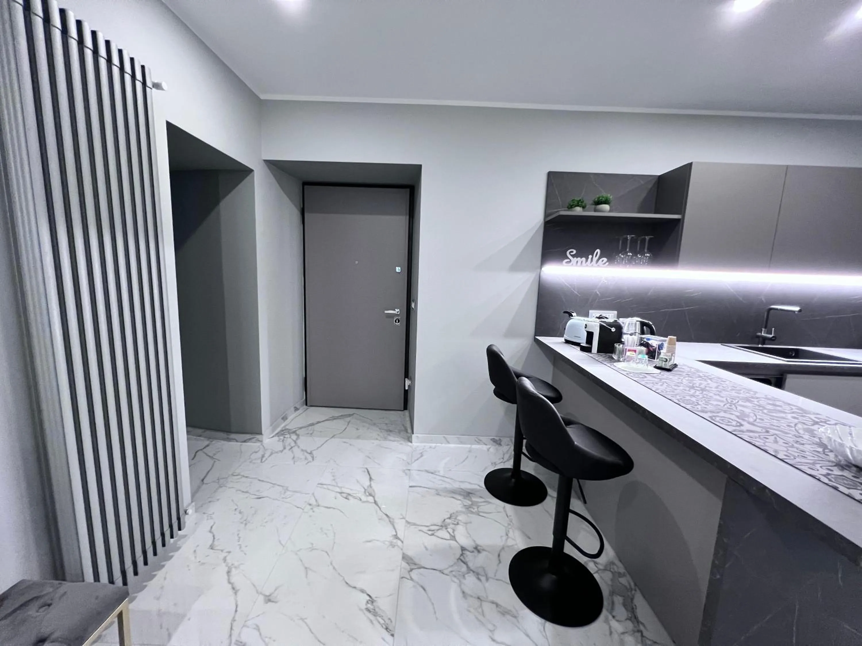 Kitchen or kitchenette in Le Porte luxury apartment