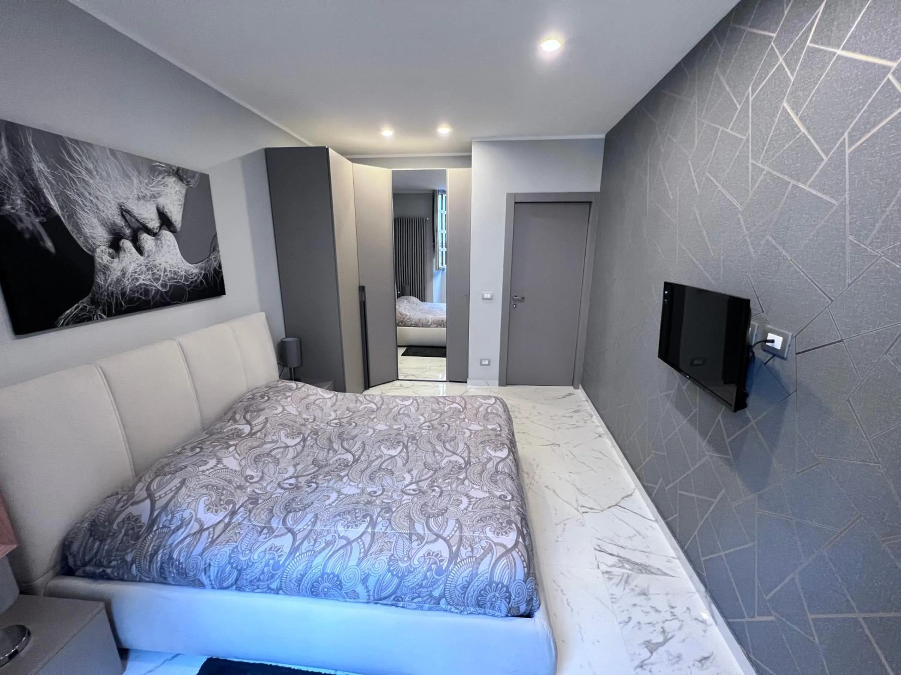 Bed in Le Porte luxury apartment
